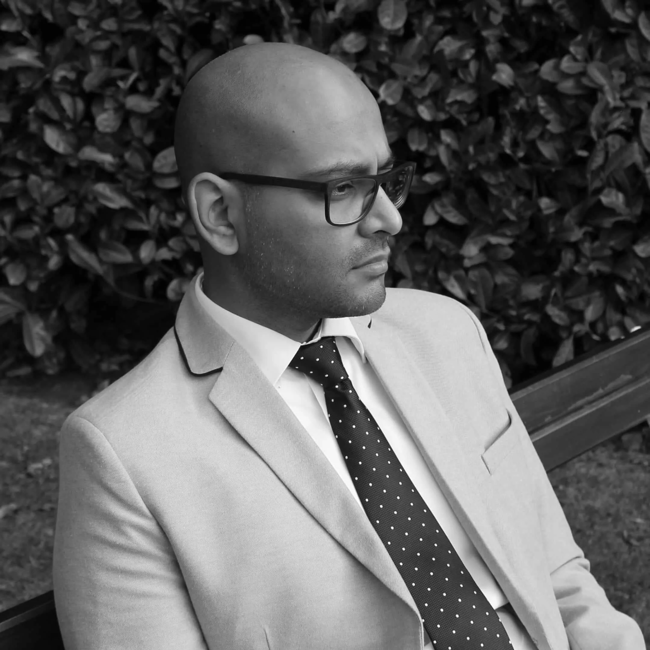 Black and white profile photo of Hemal Patel, founder of Studio Hemal Patel