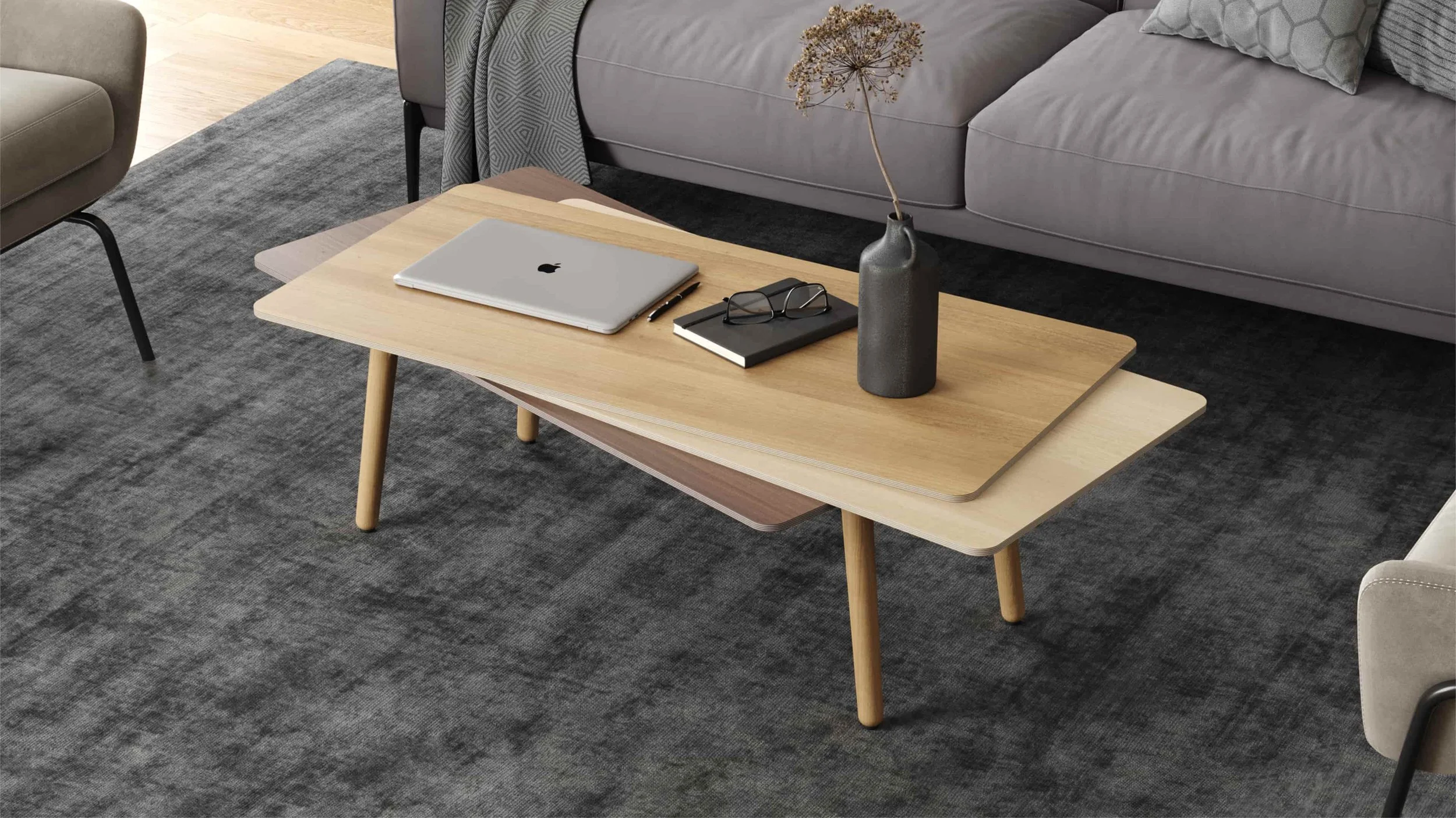 The Stacked coffee table in wood. This version is made of an Oak upper, Maple middle and Walnut bottom surface. The legs are made of solid Oak.