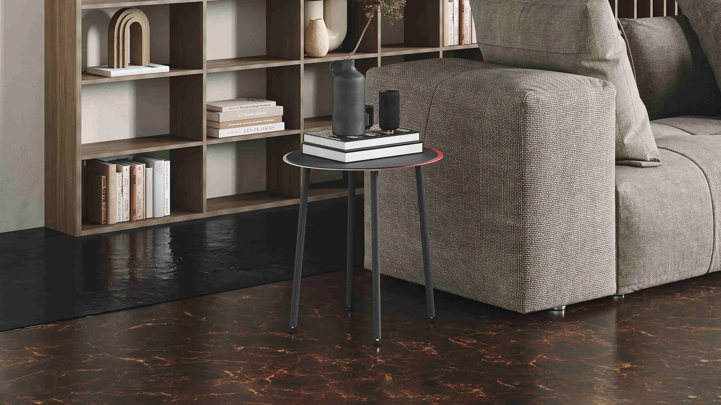 A steel Stacked side table in black. The red and white detail adds a pop colour to any interior.