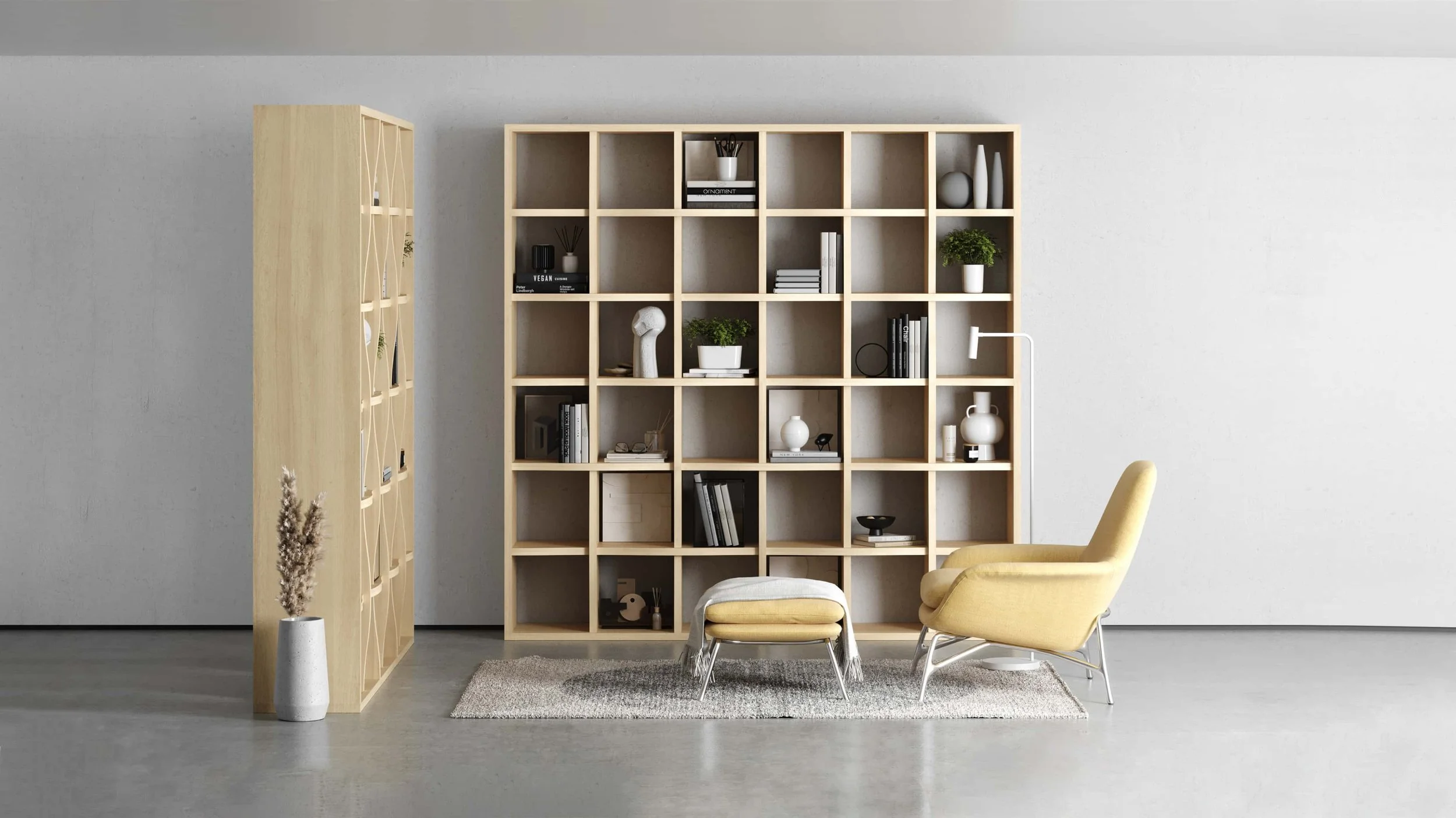 Two adjacent Weave bookcases in whitened Oak. When viewed head on the weave structure is hardly noticeable, but from the side view the interlacing pattern becomes discernible.