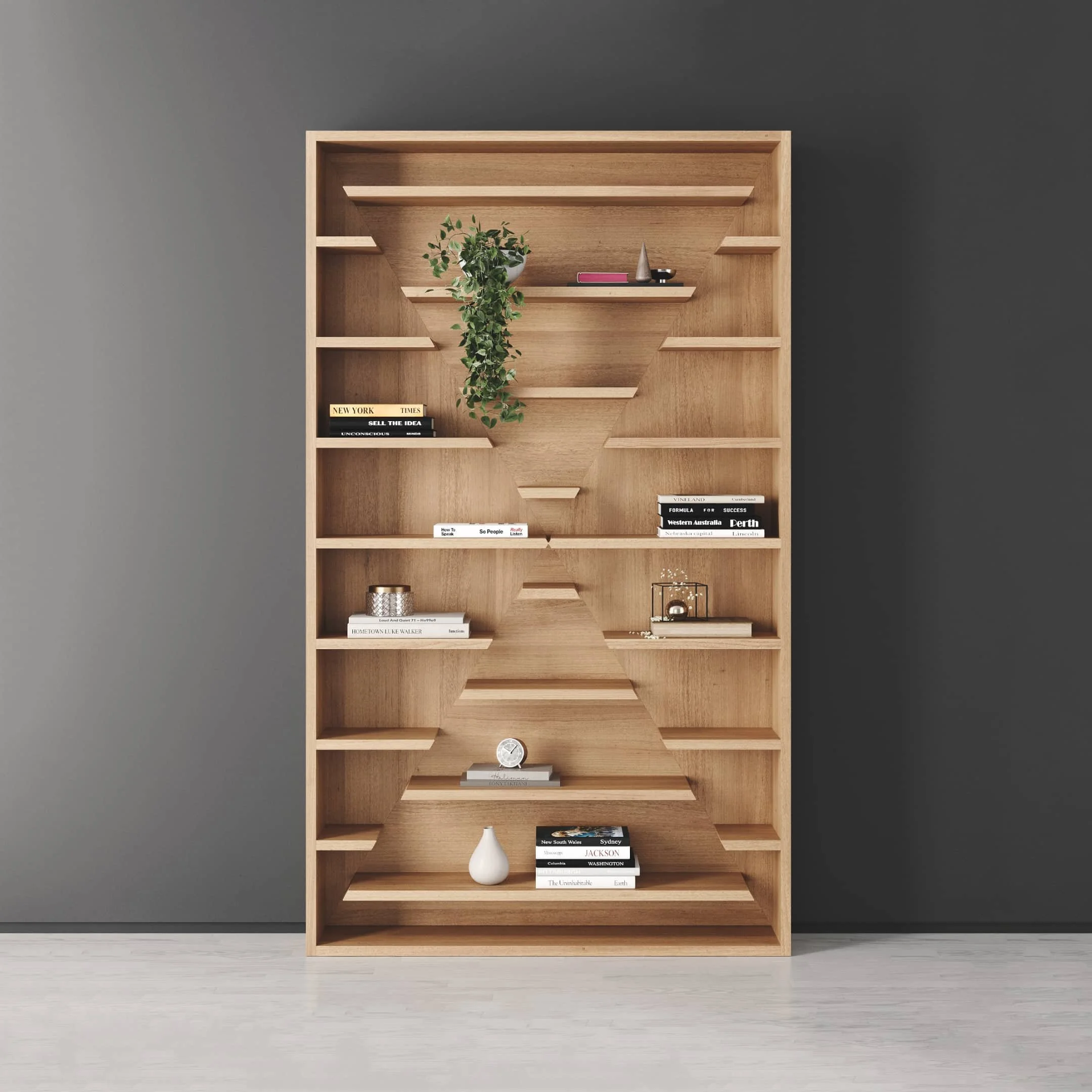 A single X-Factor bookcase in solid Oak. The displaced shelves create a X-shaped pattern down the centre of the bookcase.