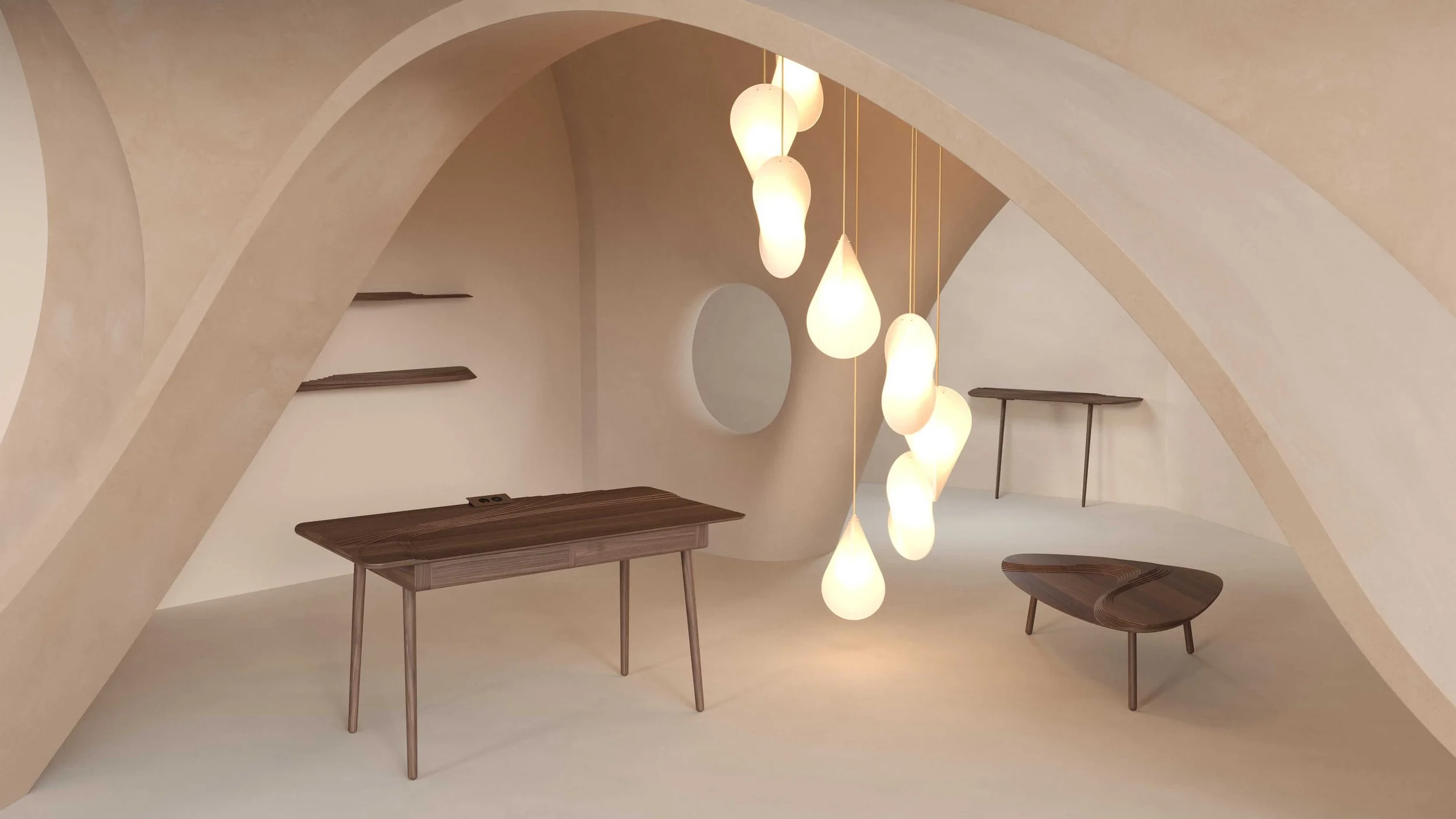 Multiple Oh Lloyd! pendant lights in a spiral arrangement. The lights are turned on and emit a warm yellow glow. They have gold cable flex and brass fixings.
