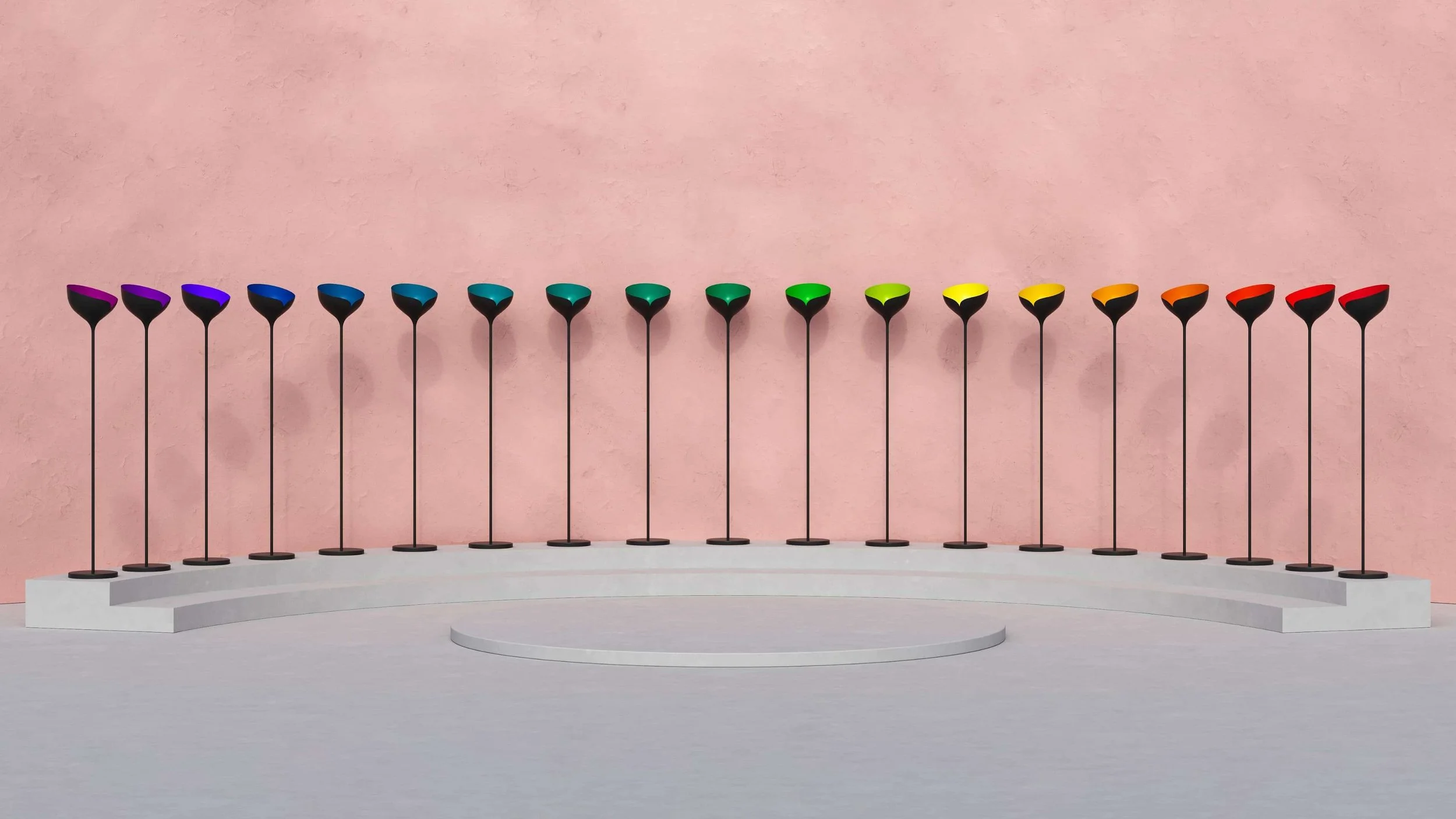 An array of Bloom uplighters each with a different head colour, in the reverse sequence of the colours of the rainbow (violet to red, left to right).