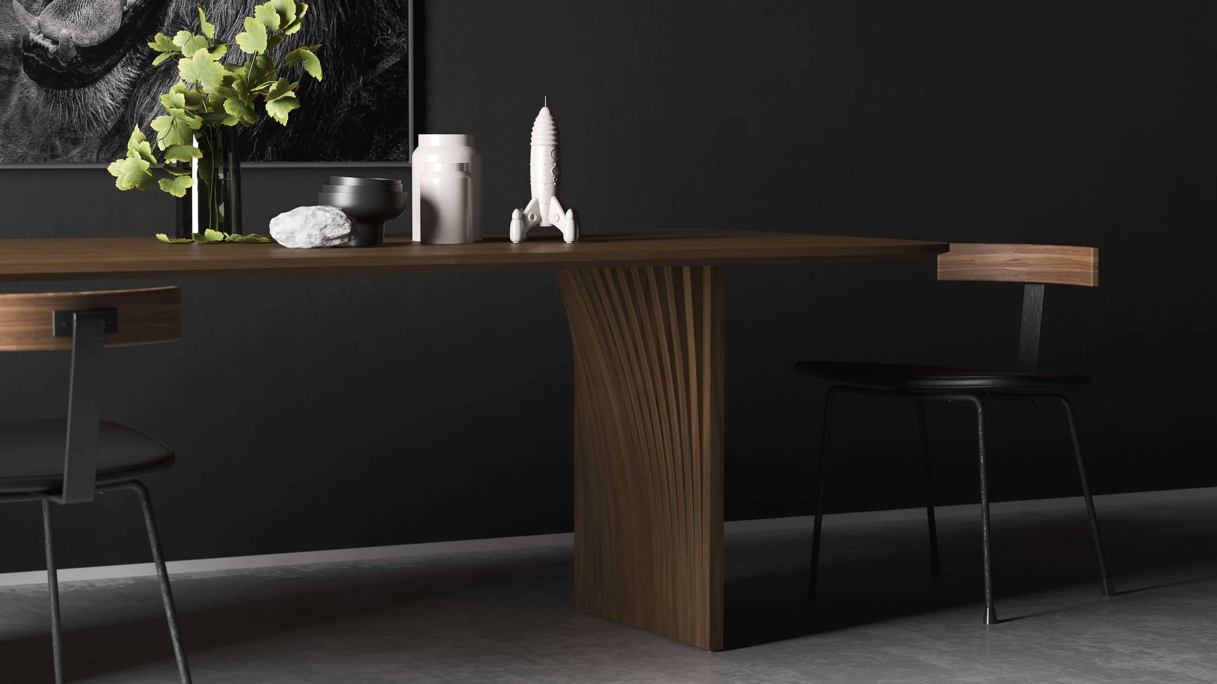 Detail view of the base of a Sheer dining table. The layers of wood reference the different layers of sedimentary rock formations.
