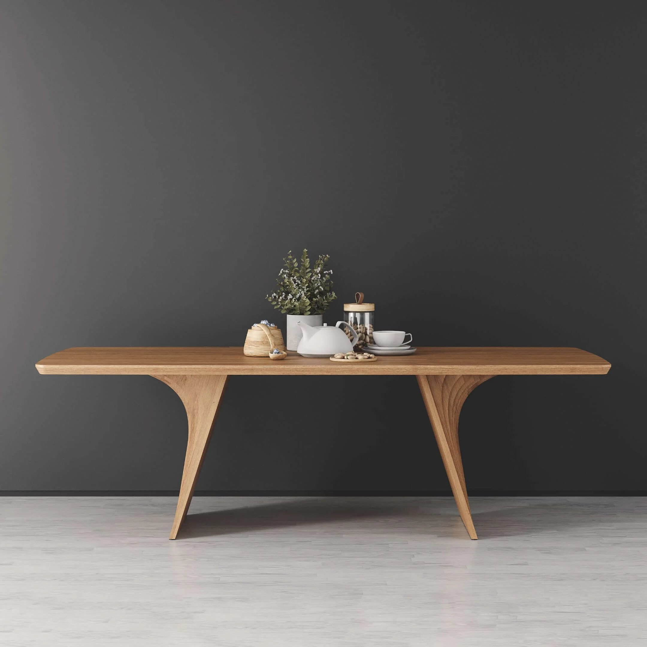 Side view of a Veer dining table in solid Oak. It is designed to easily accommodate 10 seats.