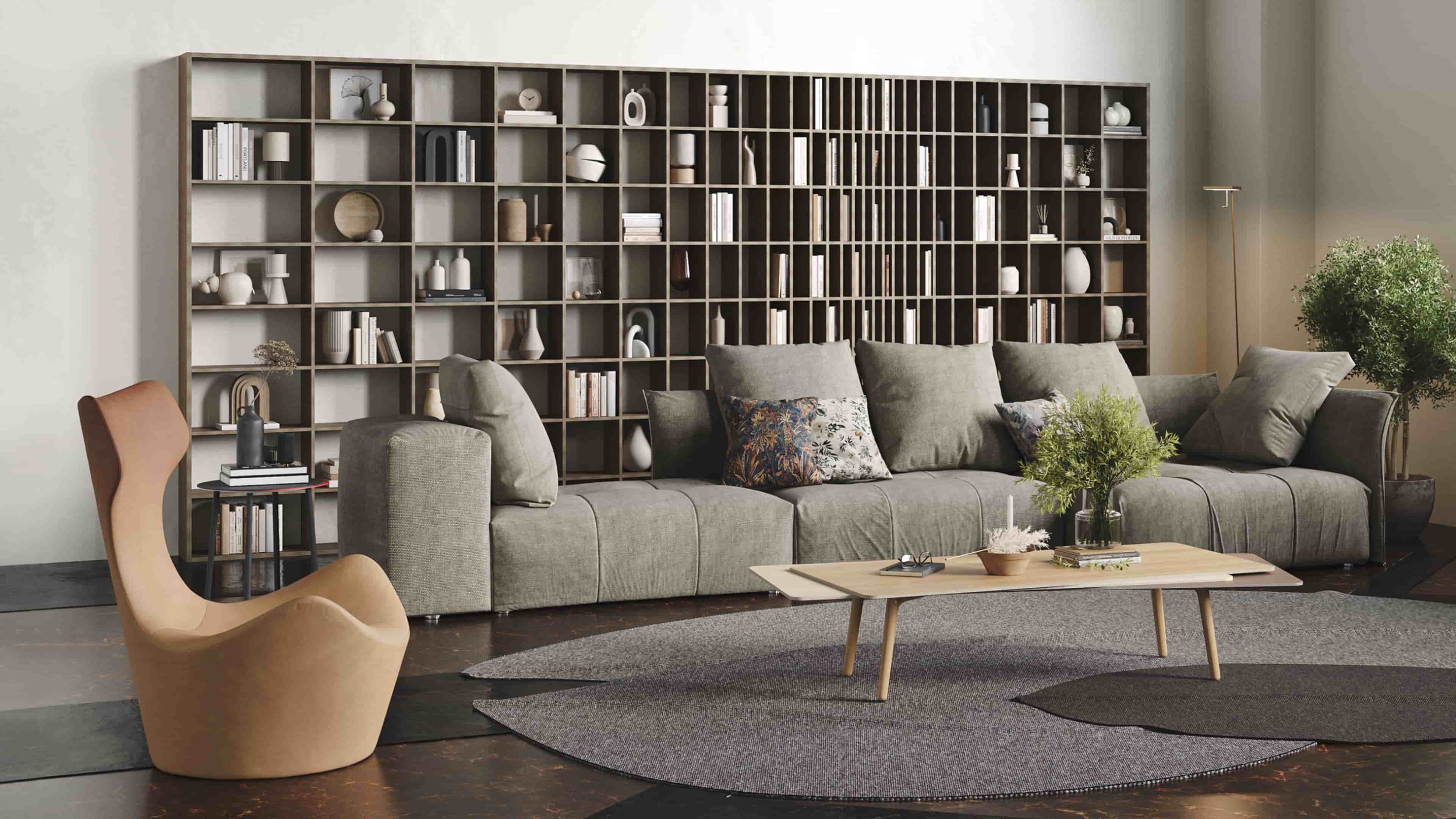 A Doppler bookcase in Walnut takes pride of place along the back wall of a stylish living room.