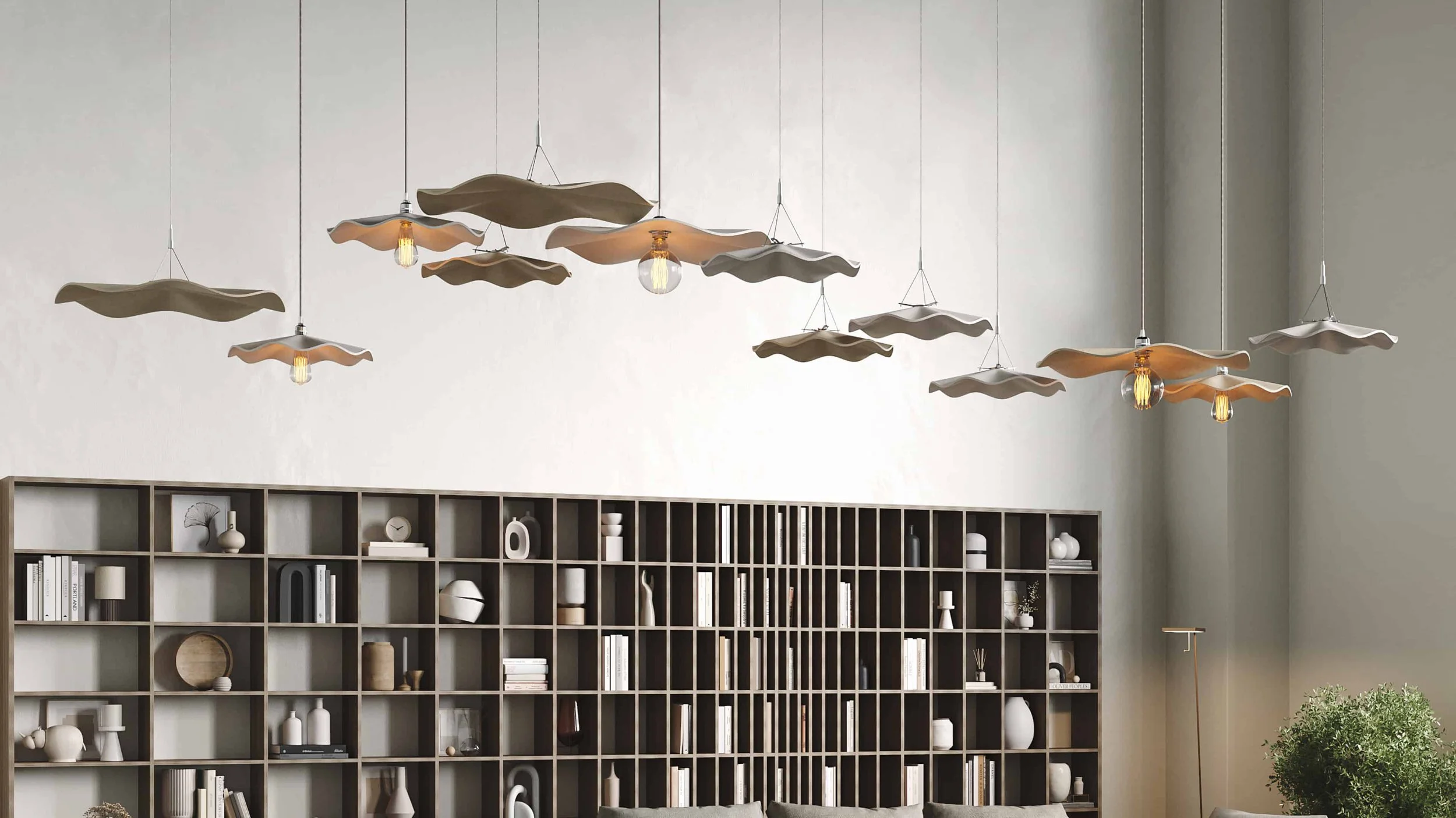 A grouping of Flutter acoustic suspension panels and pendant lights make a decorative suspended feature in a stylish living room.