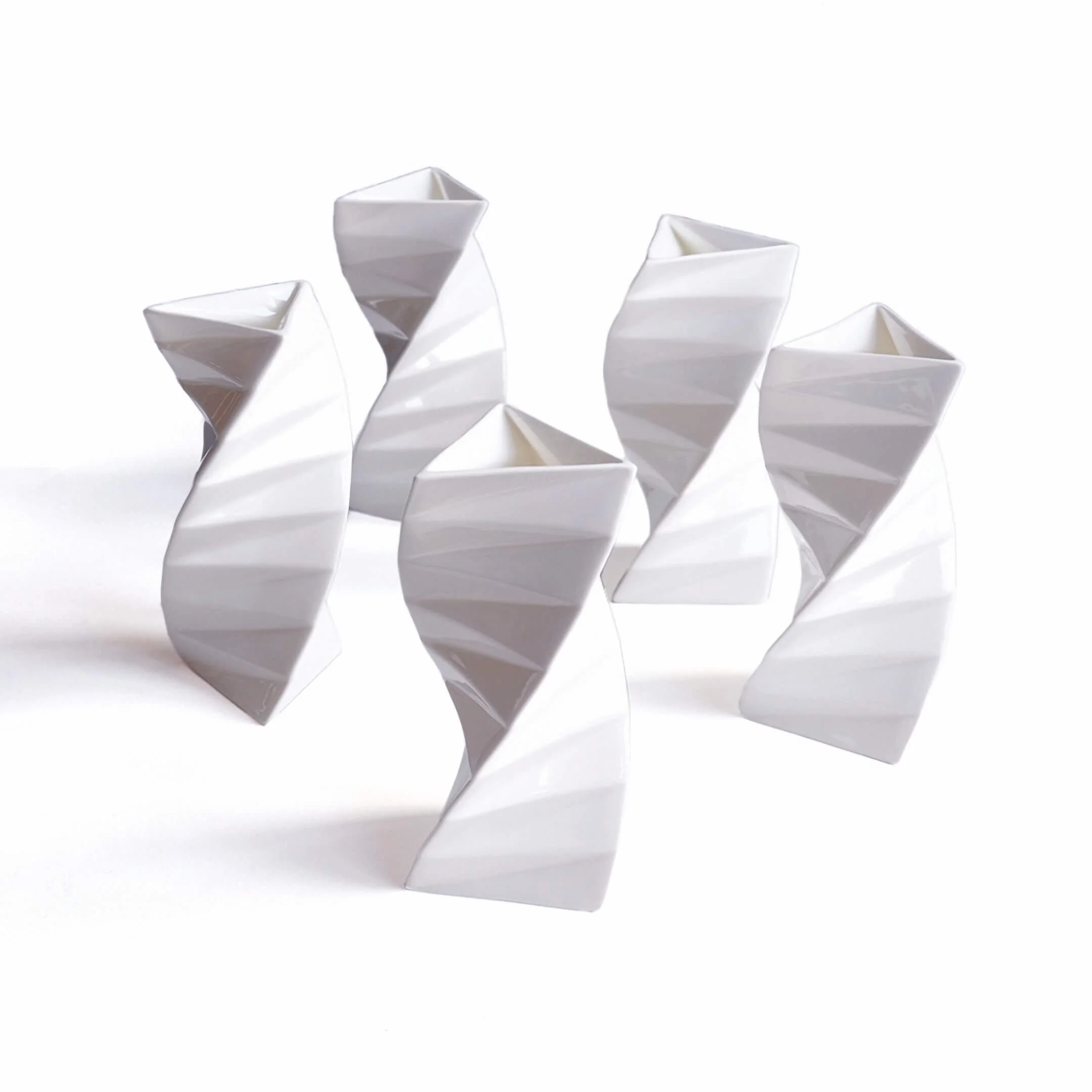 A cluster of Orishe vases, each orientated at different angles, to display its beautiful twisting form.