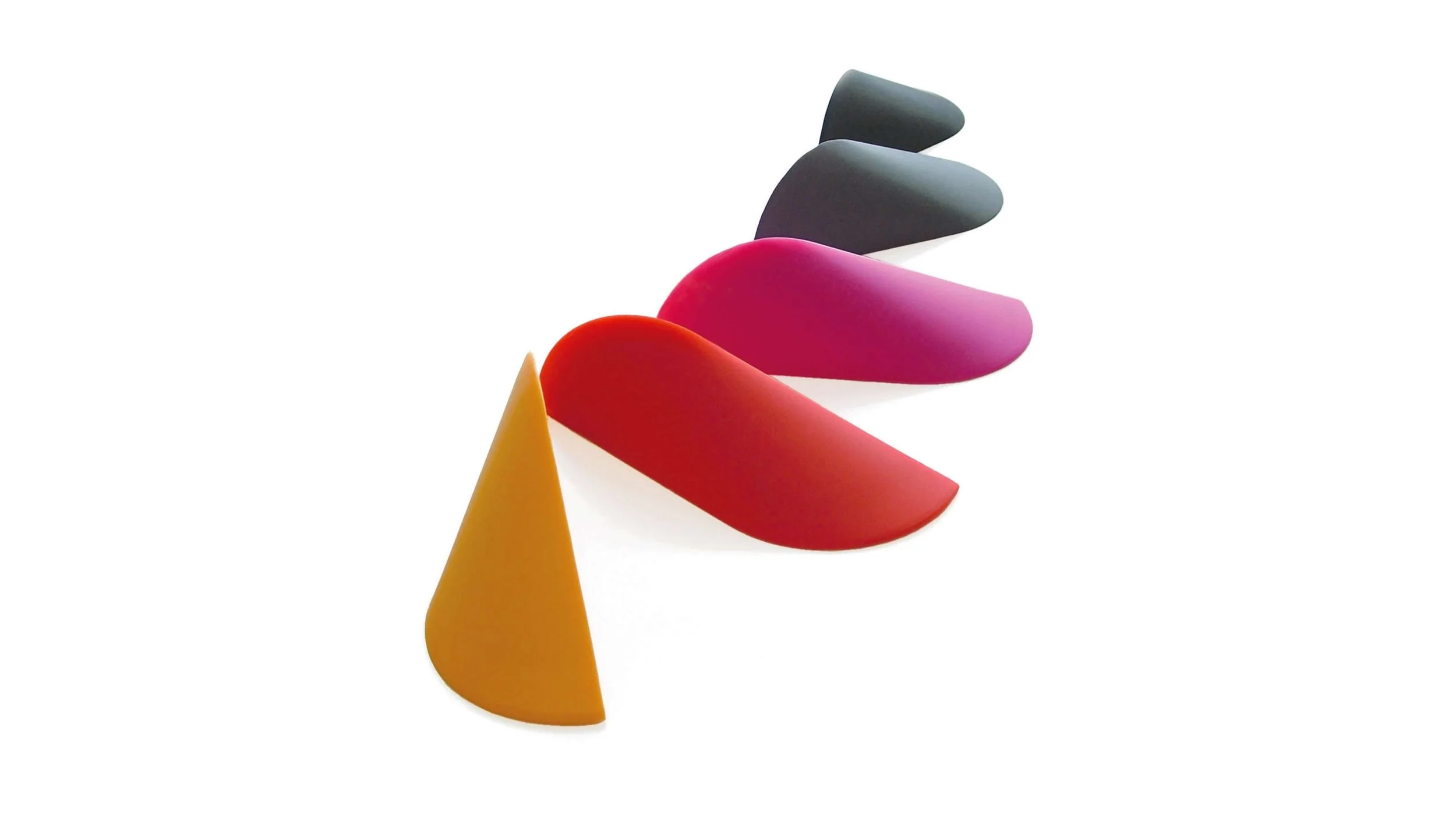 All five colours of the Ooob Doorstop and Bookend - Mango, Red, Pink, Grey, Black.