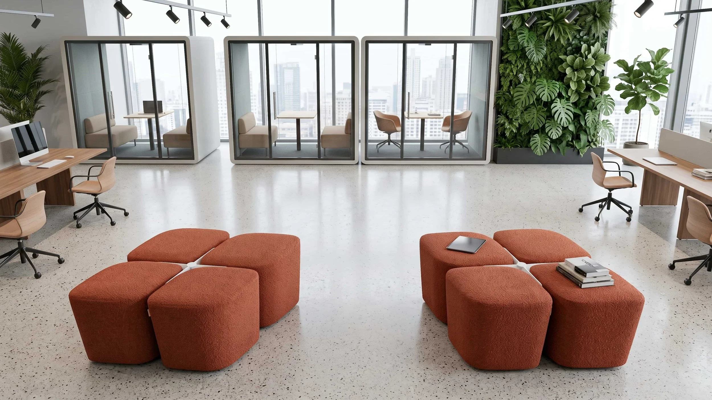 Two Rhombic Seating Systems with Docking Bases neatly squared away in a breakout area of a modern office.
