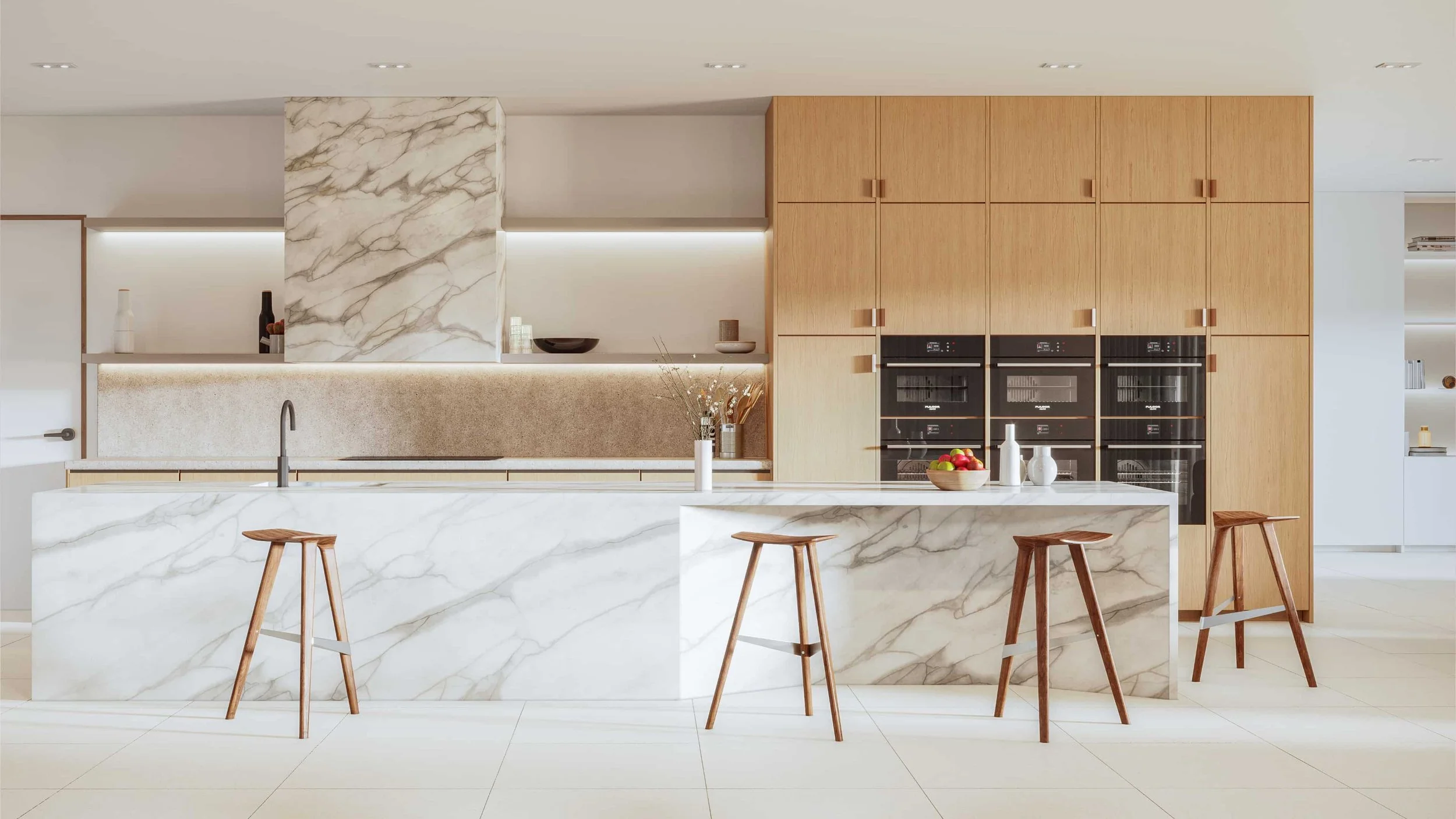 Four Delta stools in front of a marble island in a modern kitchen. The stool’s sleek design complements the clean, minimalist lines of the designer kitchen.
