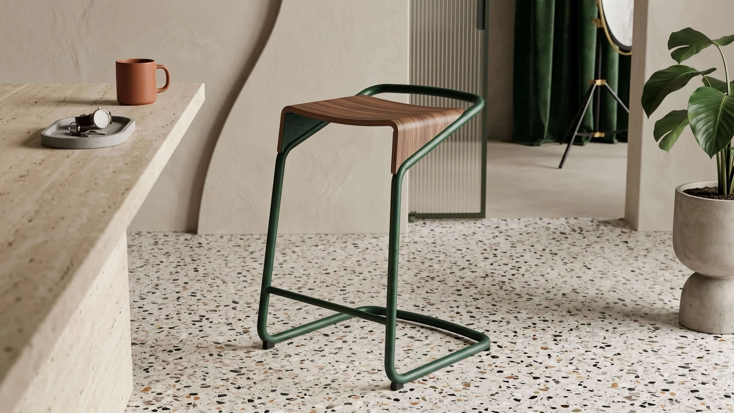 Camber stool with green frame and Walnut seat in a modern living space.