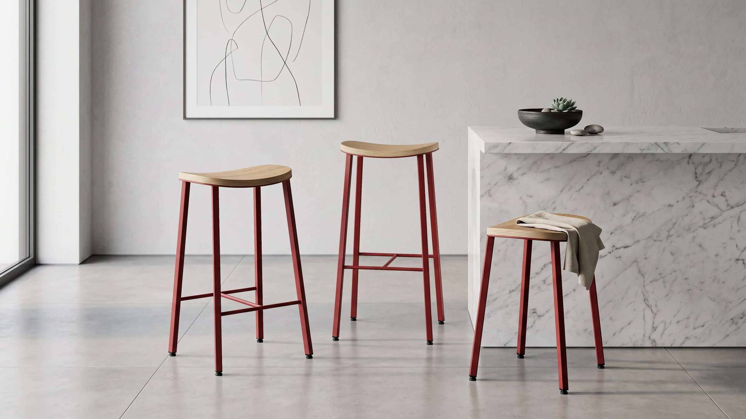 The three sizes of the Kanso stool - counter, bar and low. Each has an Oak seat and red metal frame.