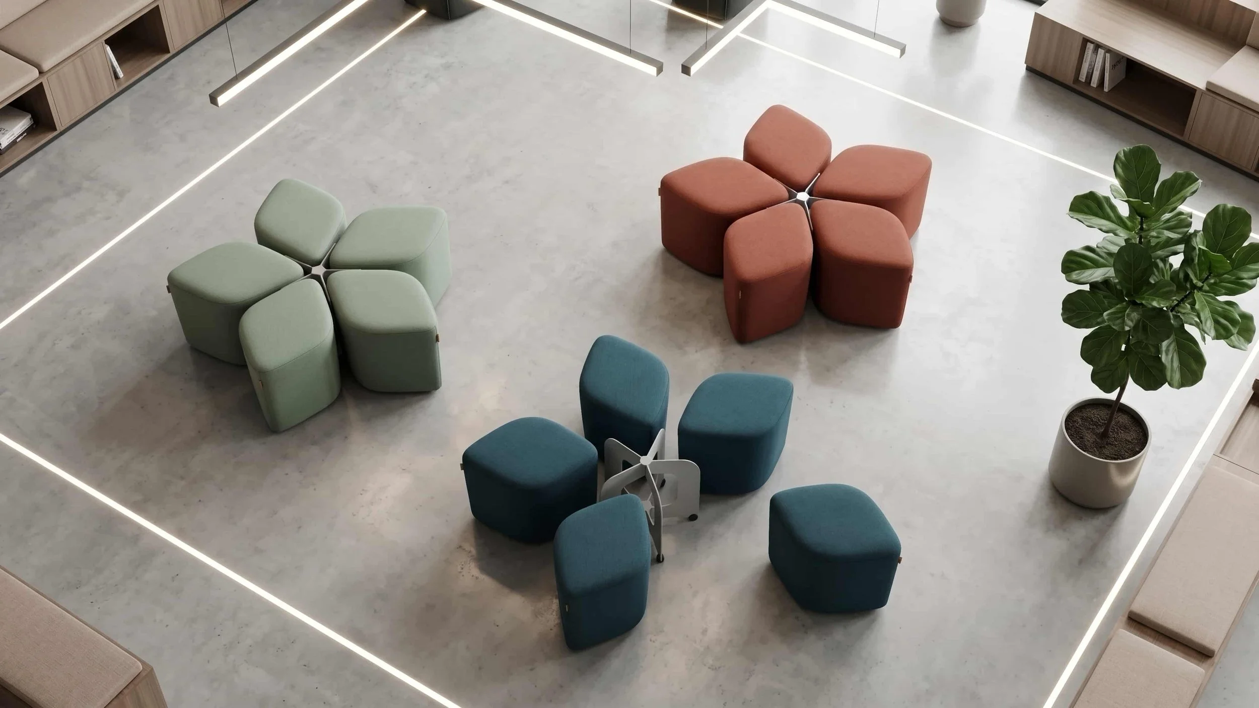 Three Blossom Seating Systems with Docking Bases in a communal area of a workplace.