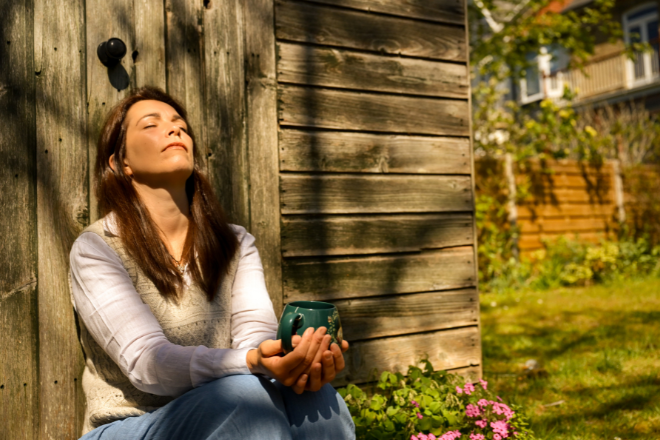 Katie Furneaux grounding outdoors during trauma therapy and nervous system work
