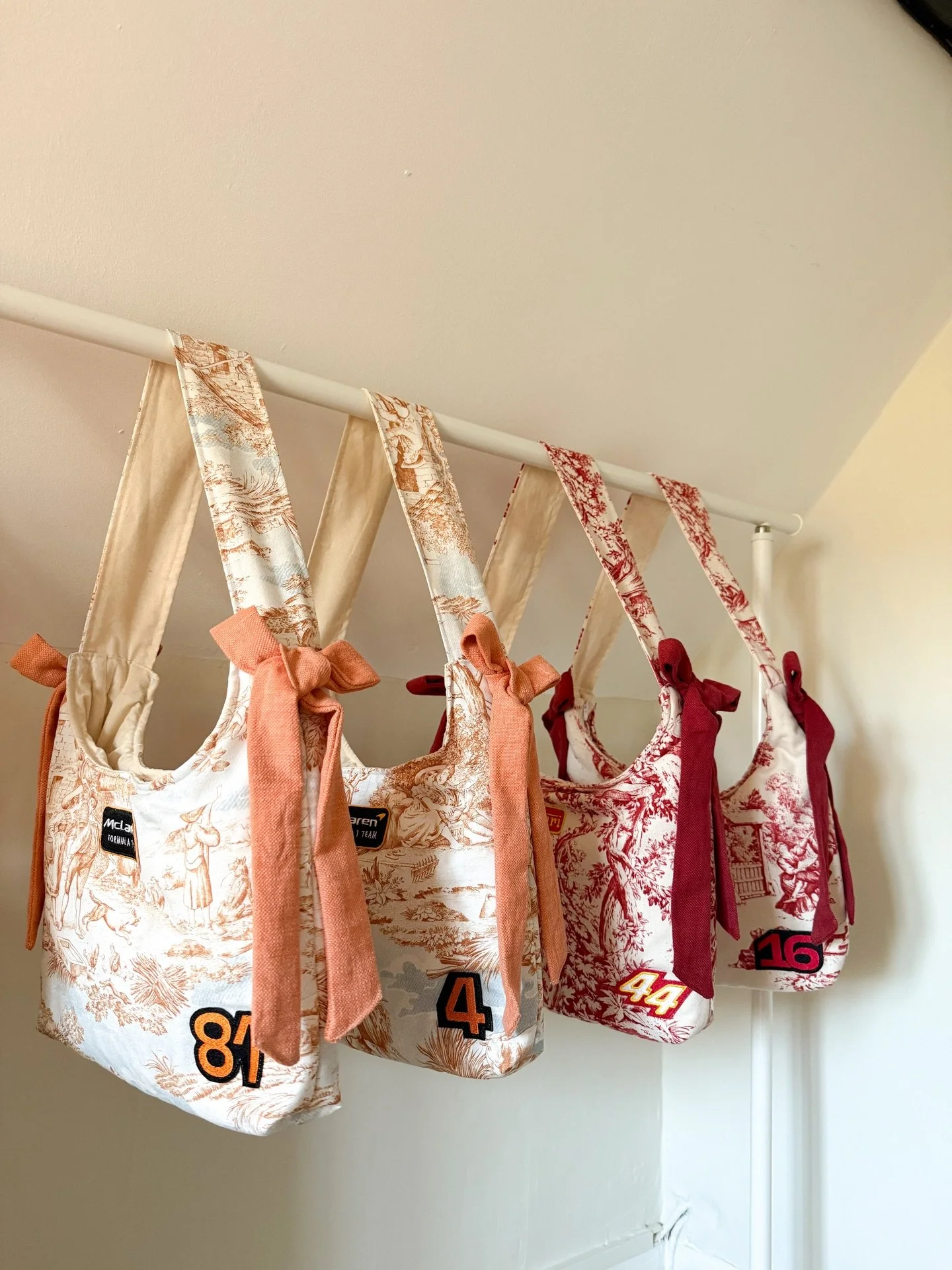 What to expect in the next drop 🏁❤️✨

&bull; Bow bags &mdash; customisable with driver numbers
&bull; New Cadillac bow bags
&bull; Bespoke corsets
&bull; Laptop cases

Comment &ldquo;Final&rdquo; if you&rsquo;d like to be sent the F1 order guide 🏁
