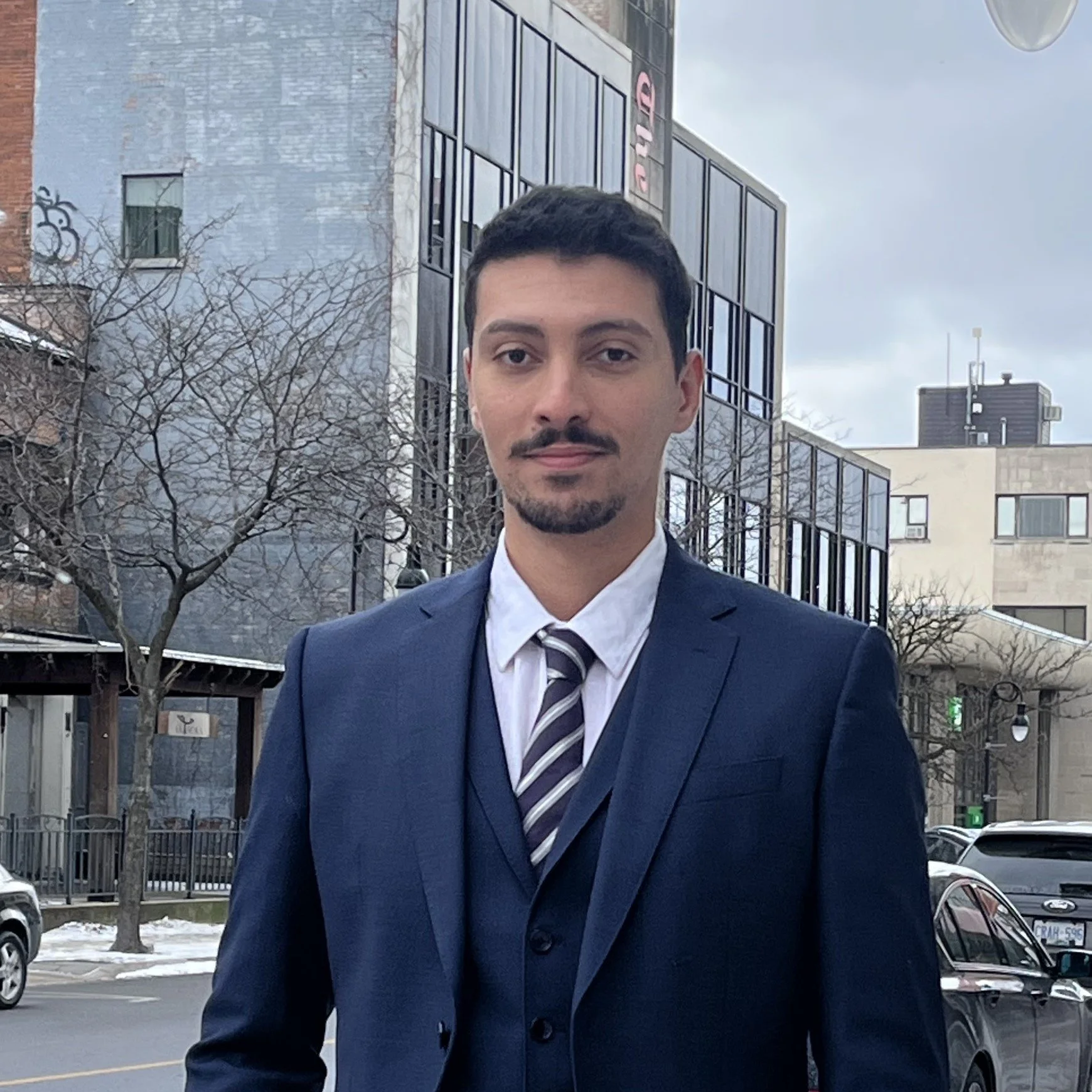 A doctor wearing a blue suit