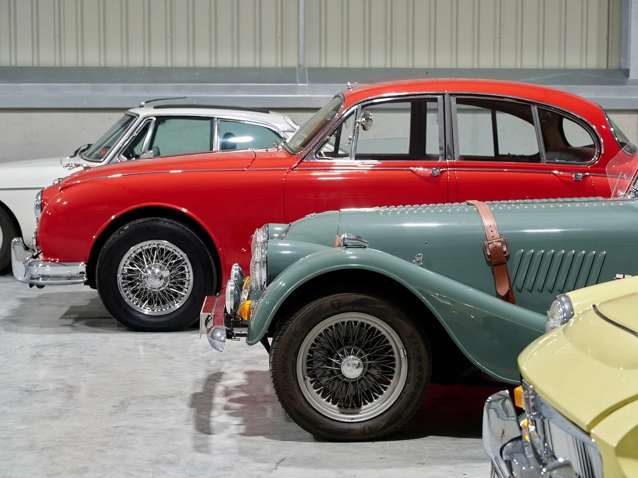 Close-up of classic cars stored in The Car Den's Standard Indoor facility