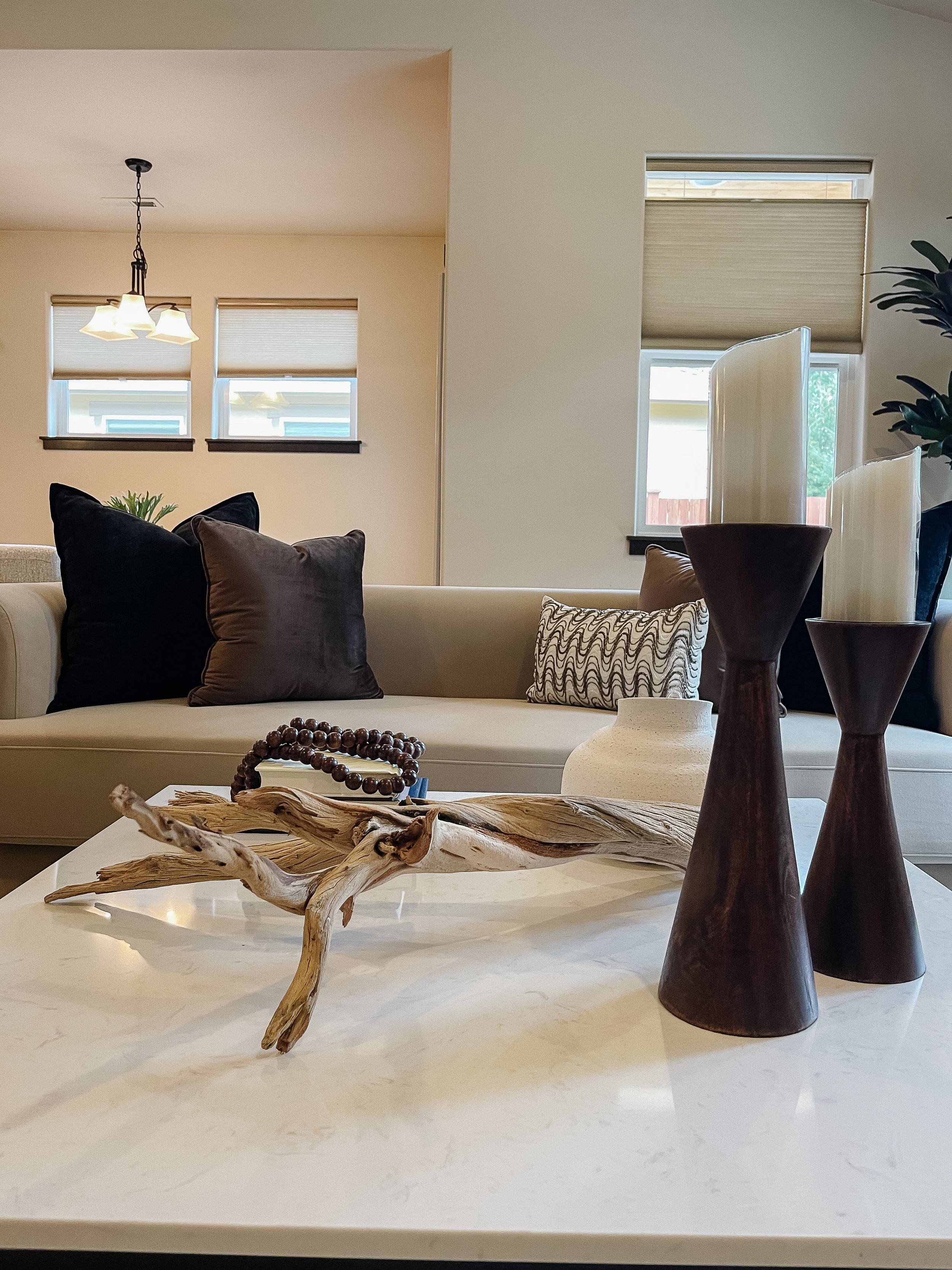 Staged living space in a Snohomish riverfront property emphasizing natural light and inviting design.