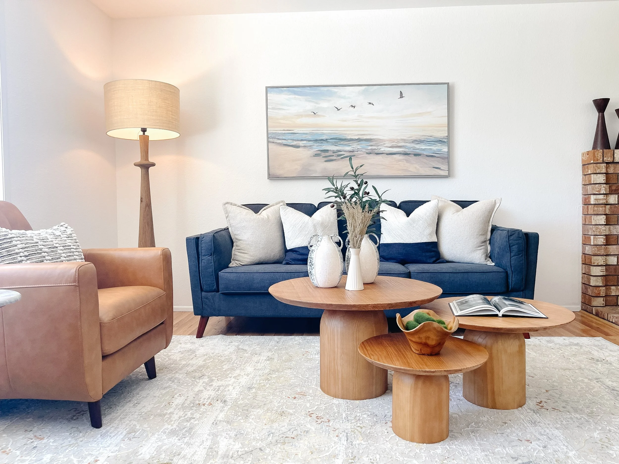 Staged living room in a Burlington home designed to highlight warmth, light, and layout.