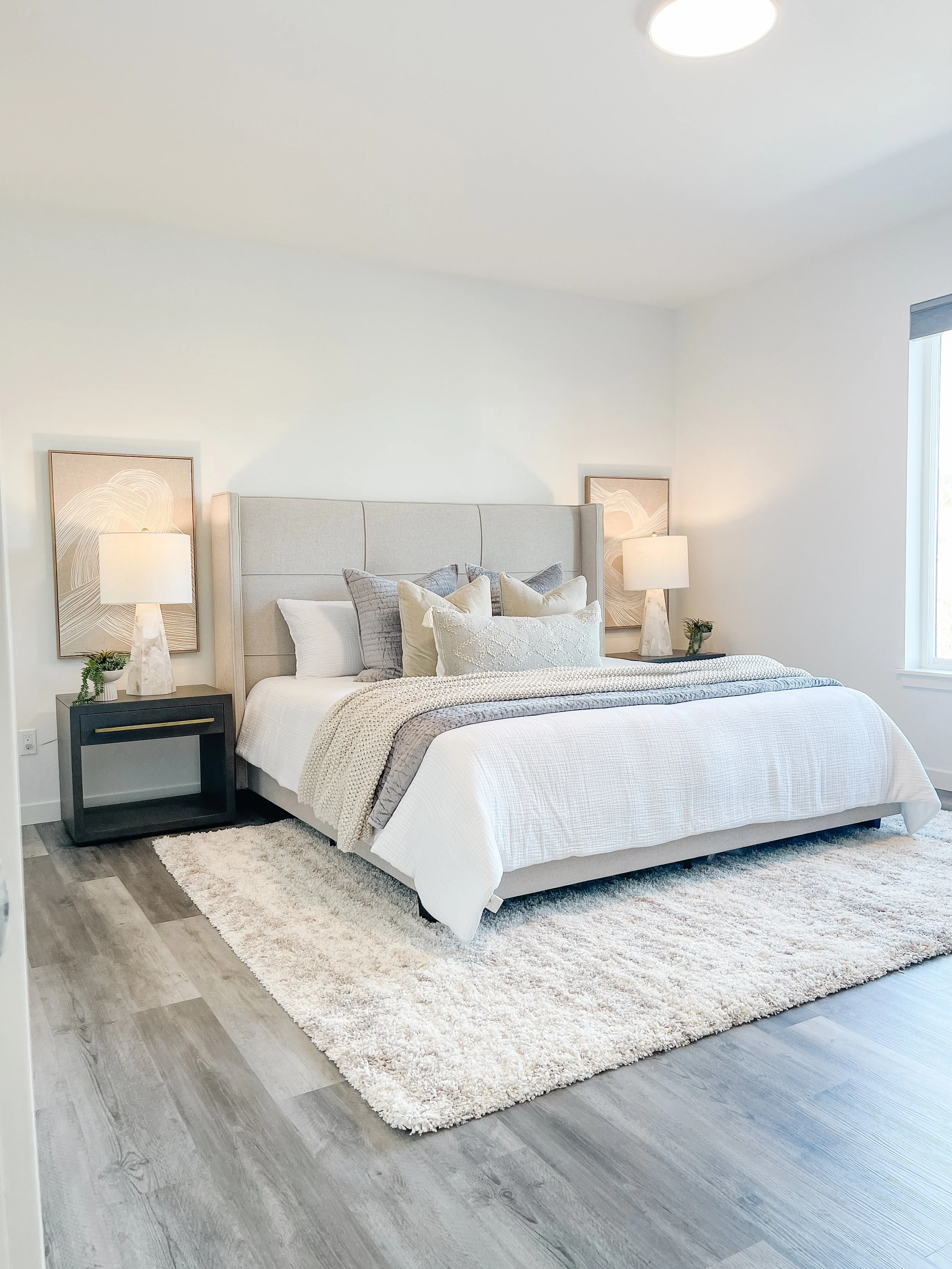 Bedroom in a Bellingham home staged to enhance natural light and make the room feel spacious.