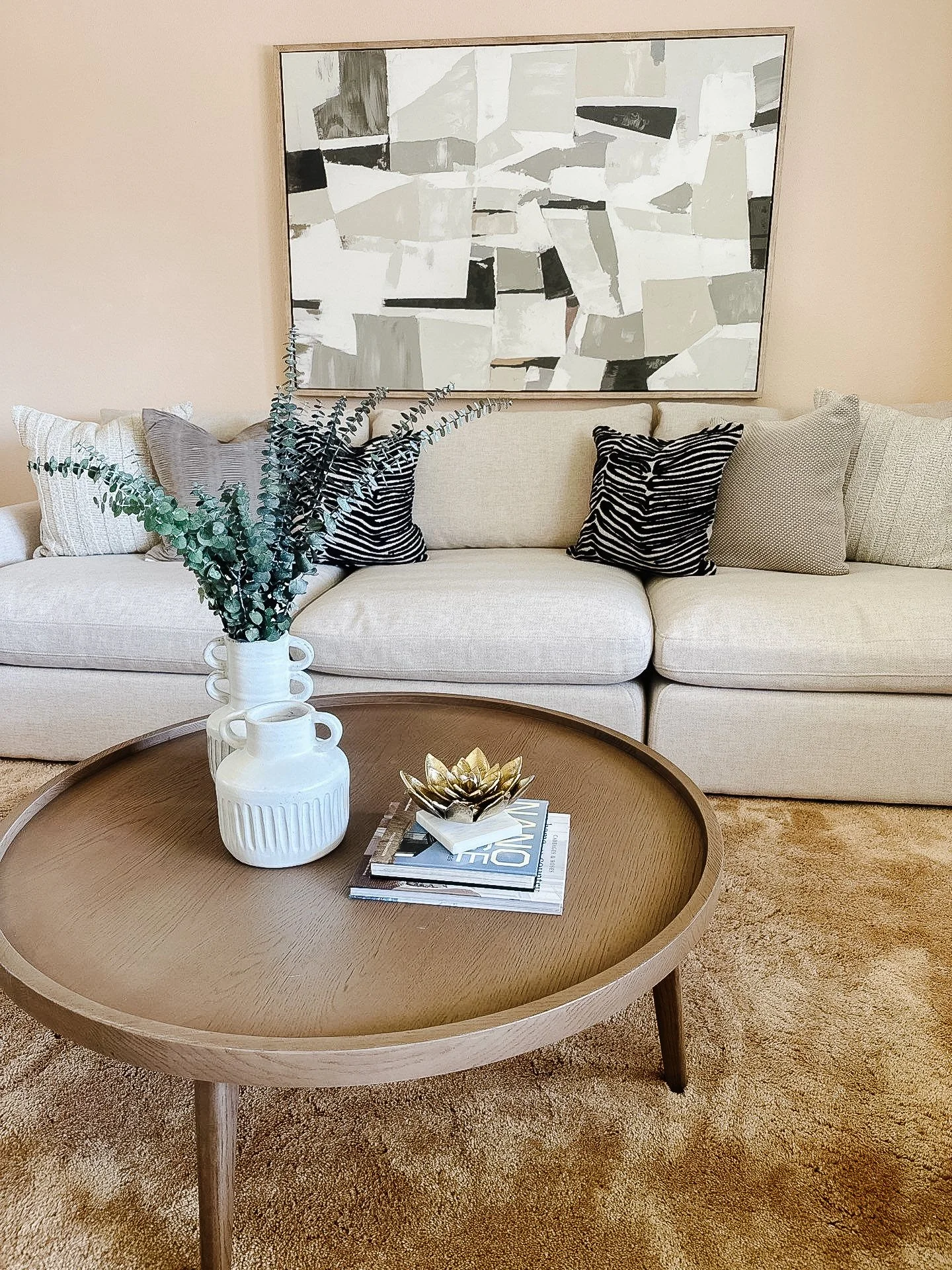 Professionally staged living room in a Mount Vernon home with neutral furnishings and modern styling.