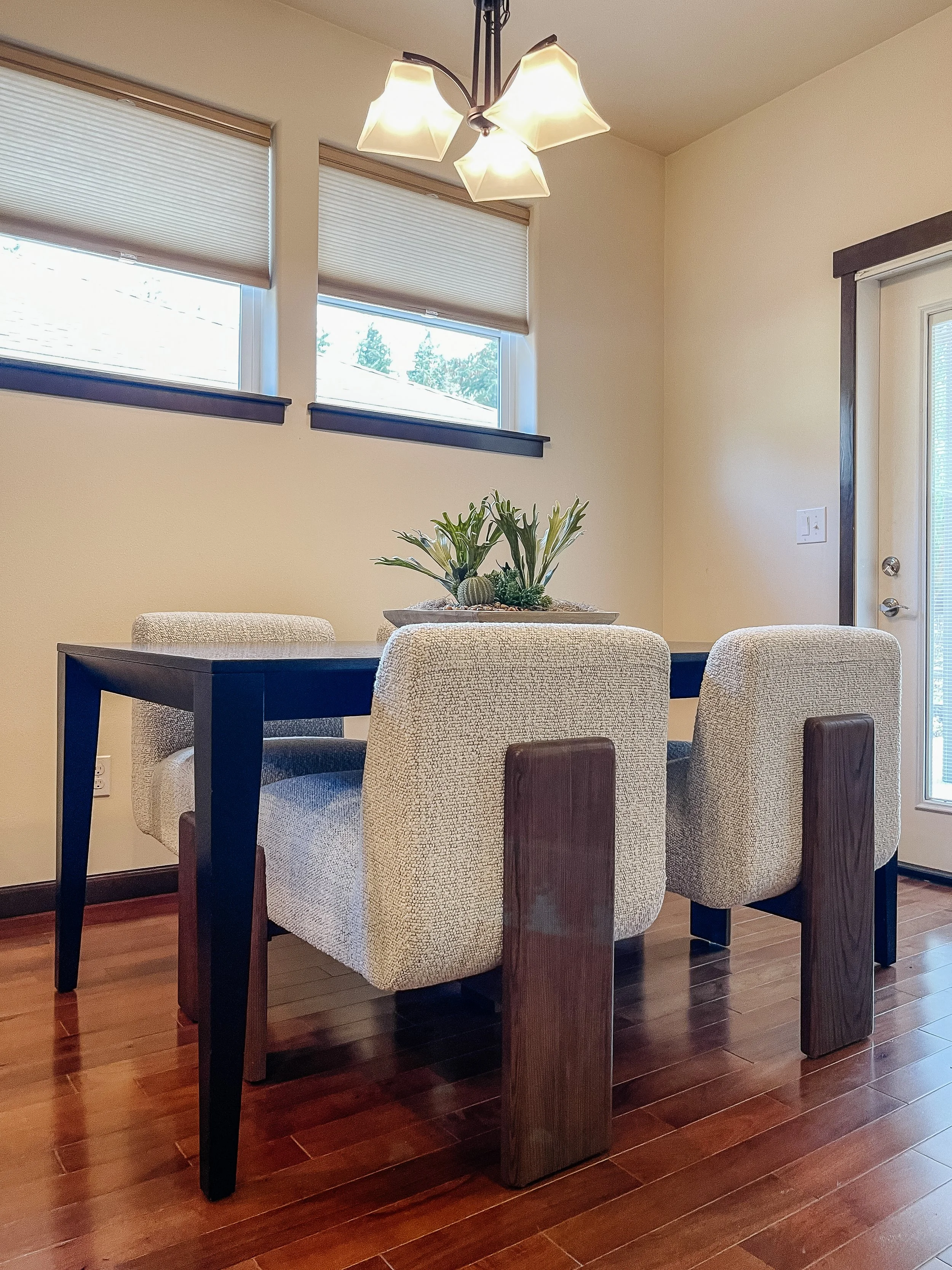 Open concept kitchen and dining area staged in a Snohomish home to highlight flow and functionality.