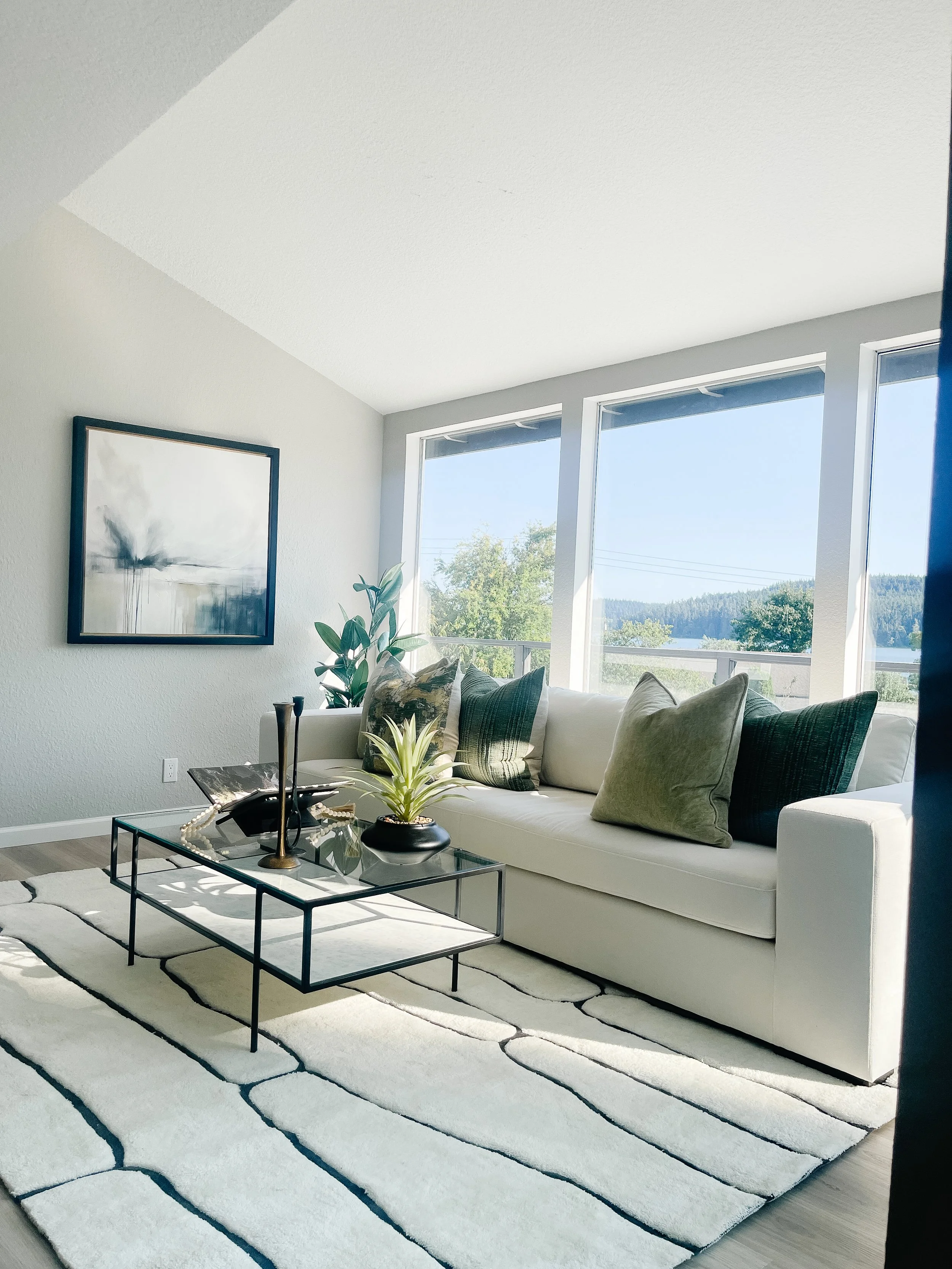 Staged living room in a Bellingham home designed to highlight warmth, light, and layout.
