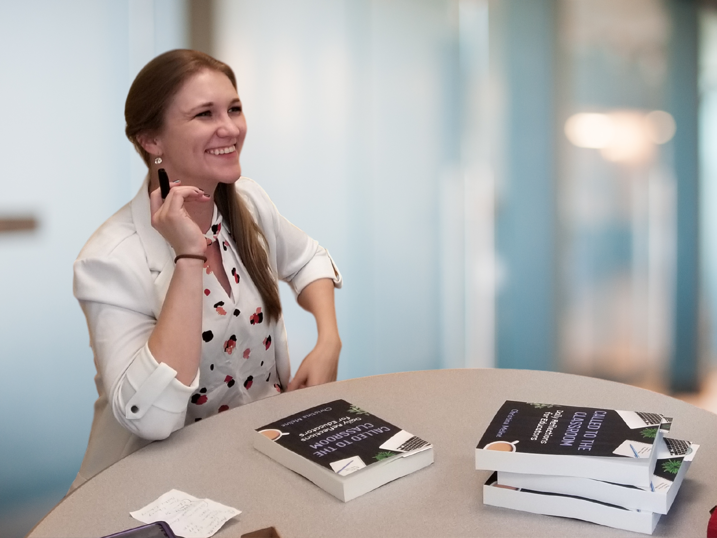 Connecting with educators and signing copies of "Called to the Classroom"