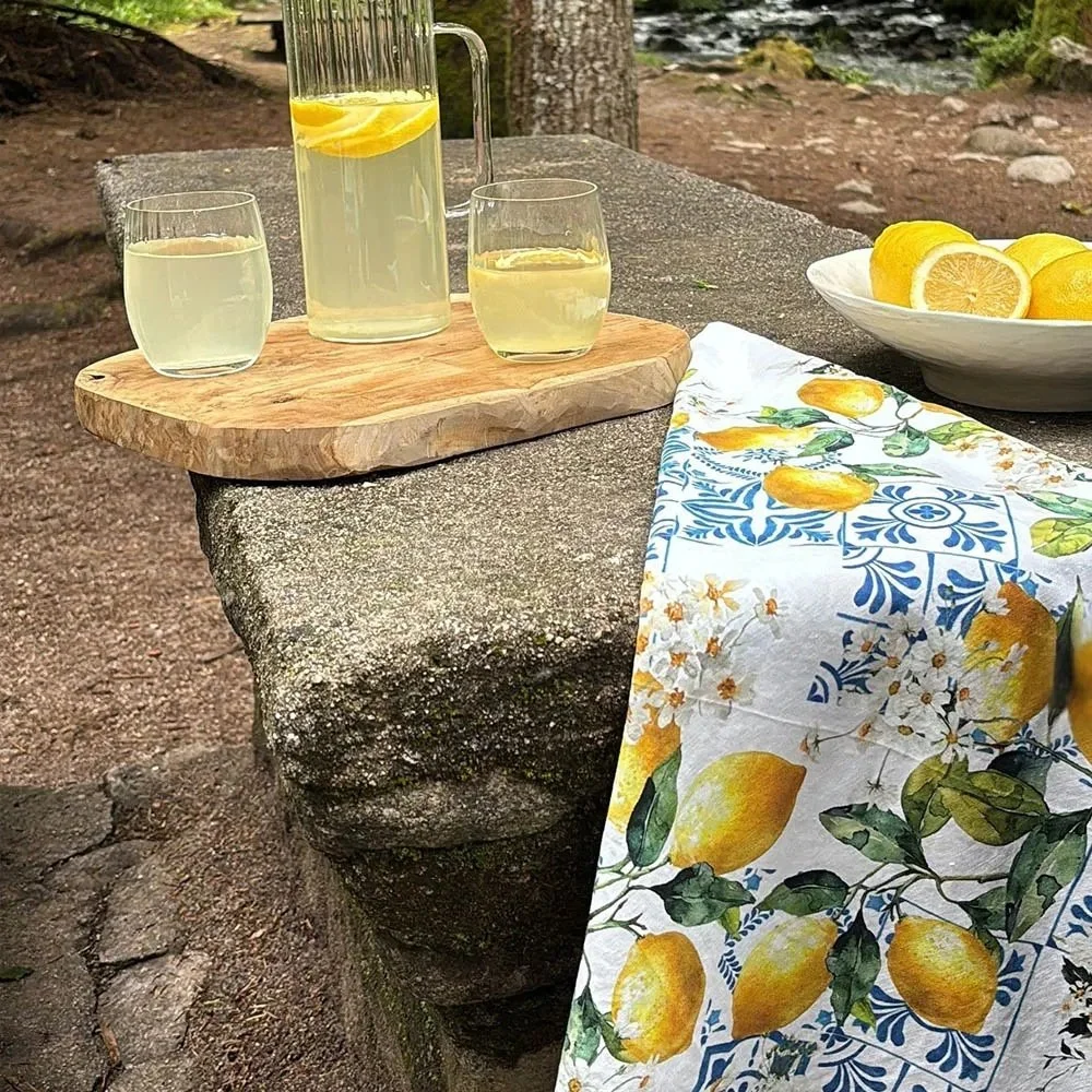 Citrons Azulejos Blue kitchen towel draped off stone table.