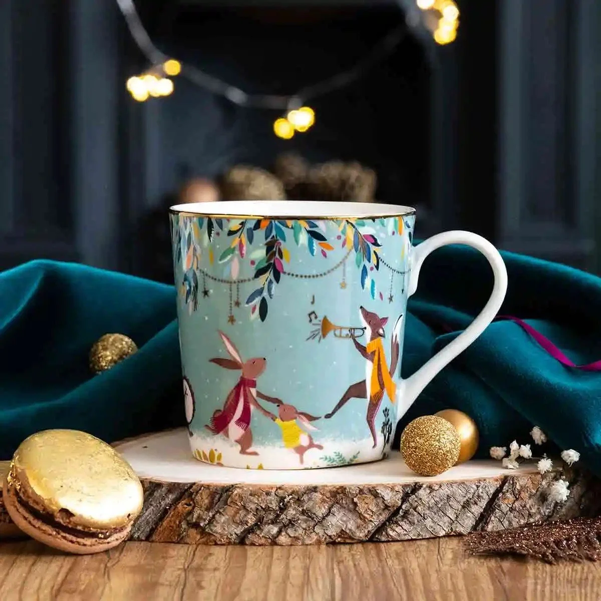 Merry Band mug resting on wood plate.