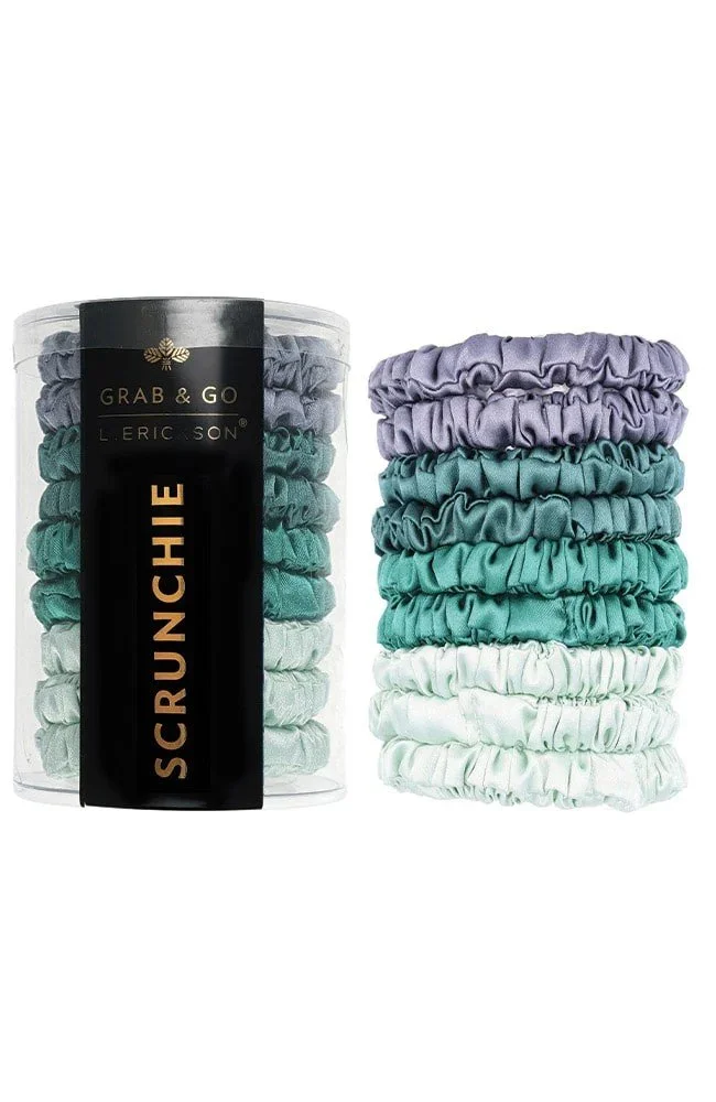 Set of 9 satin hair scrunchies ranging from a light mint to lavender.