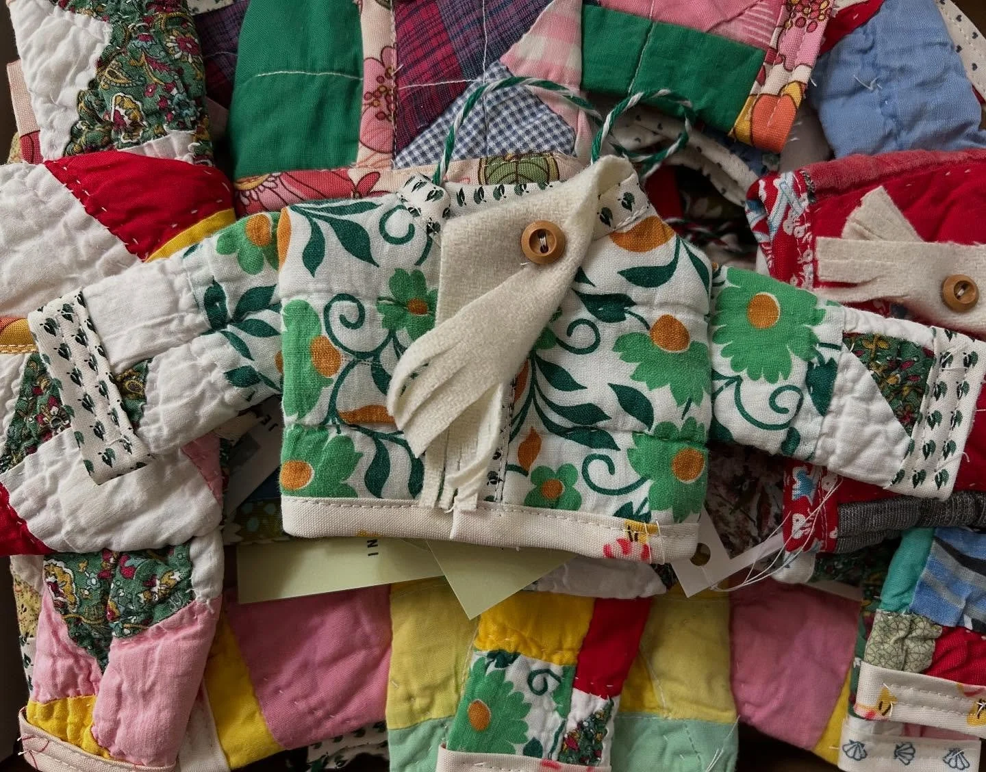 Finally done! Number 20 has a scarf 😂 and I also hid a dinosaur button on one! Come visit Higher Art Gallery starting Dec 4 to pick one up! So many cute handmade ornaments from different artists. #ornaments #handmadeornaments #quilter #quilted #quil