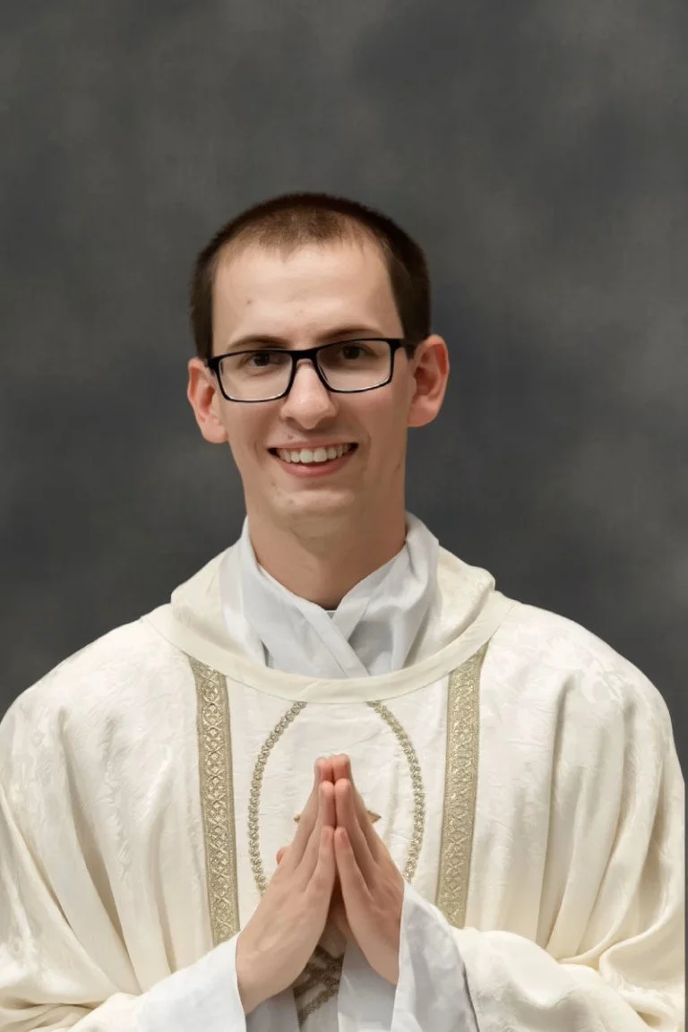 Father John Paul Stepnowski at St. Francis Xavier Catholic School in Birmingham, Alabama