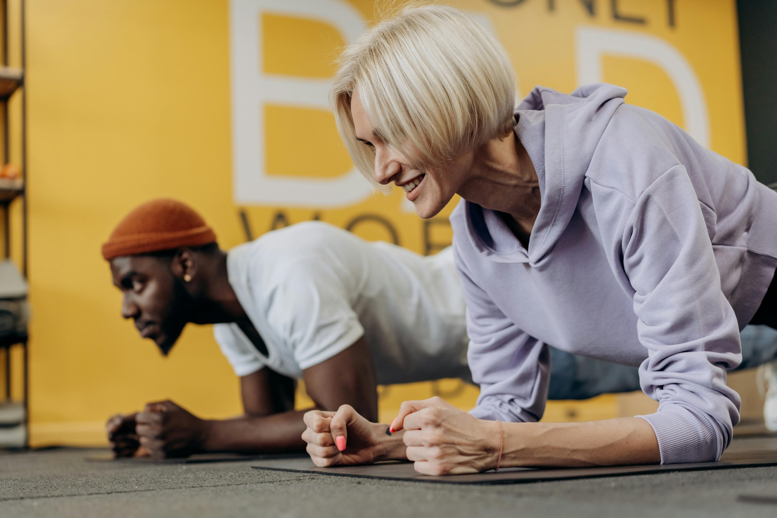 A woman working out with a personal trainer.