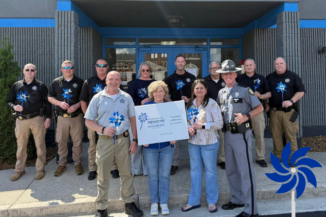  April is Child Abuse Prevention Month.  This is symbolized by blue pinwheels around the county. Our staff, SROs, Sheriff and staff, and DCBS all participated in placing the pinwheels to serve as a powerful reminder.  
