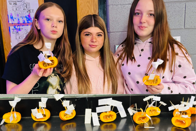  All hands on with a pumpkin dissection activity at Lynn Camp to explore and identify the reproductive structures of a flowering plant. By examining the pumpkin and its seeds, students were able to further their understanding of plant reproduction an
