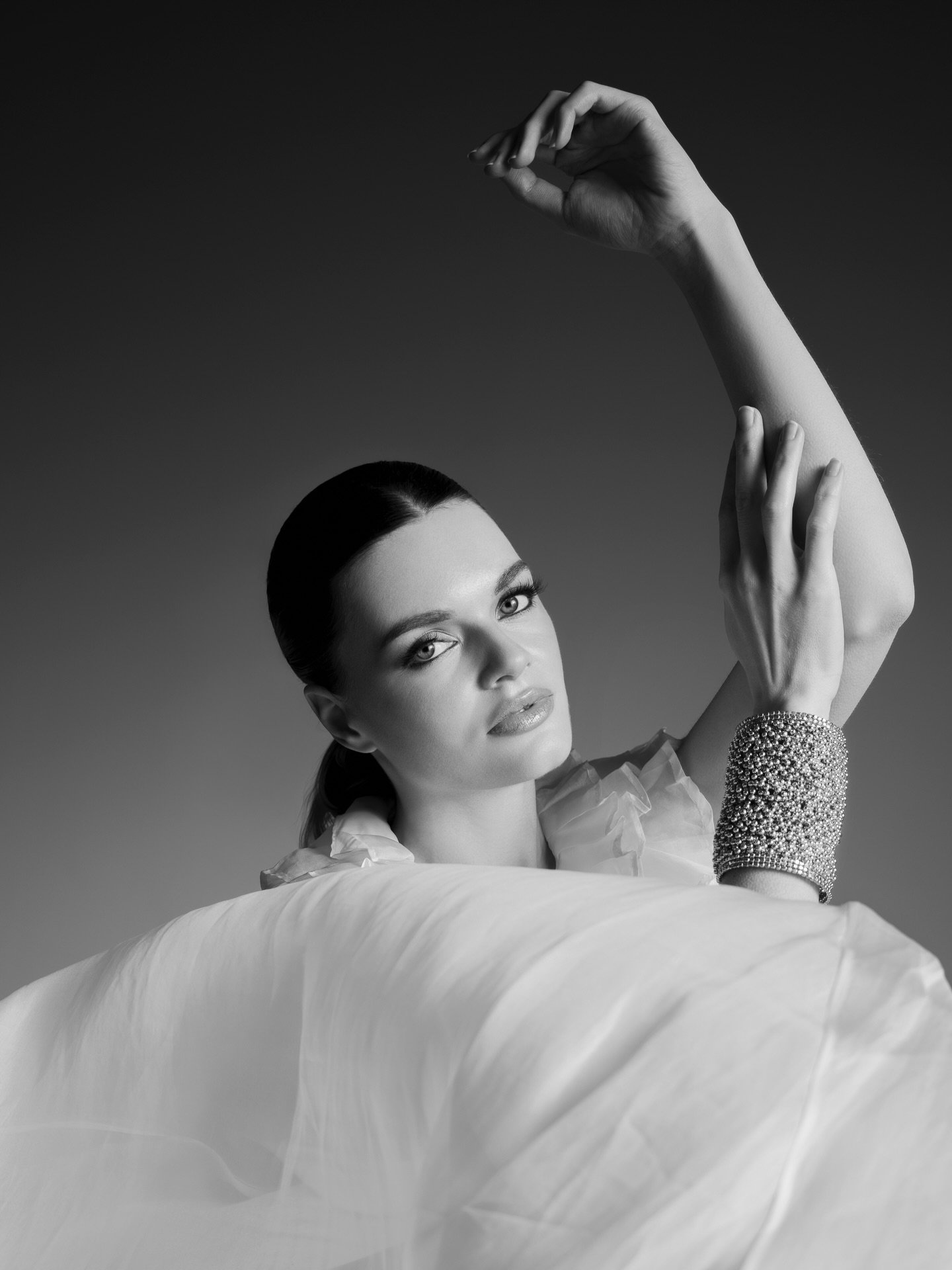 Black and white reveals what color often hides&mdash;
the emotion, the breath between moments,
the beauty in simplicity.
A concept where elegance meets intention. 

Photo @alerian_photography 
Makeup and hairstyle @joannaspapathanasioubridal 
Gown @m