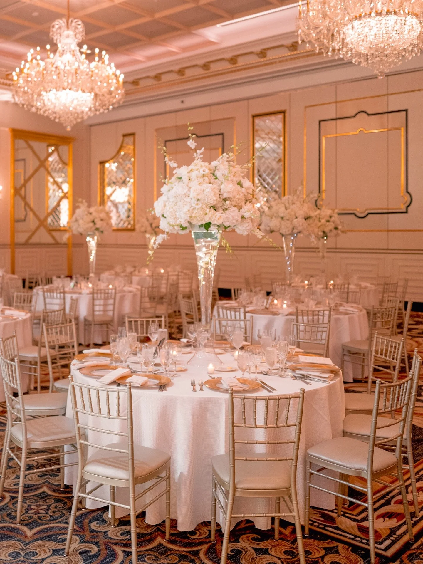 Crystal chandeliers, cascading white florals, and gold accents designed to glow long after the last dance. This is the kind of setting that turns a celebration into a statement.

Venue @hudsonhousenj 
Photo @alerian_photography