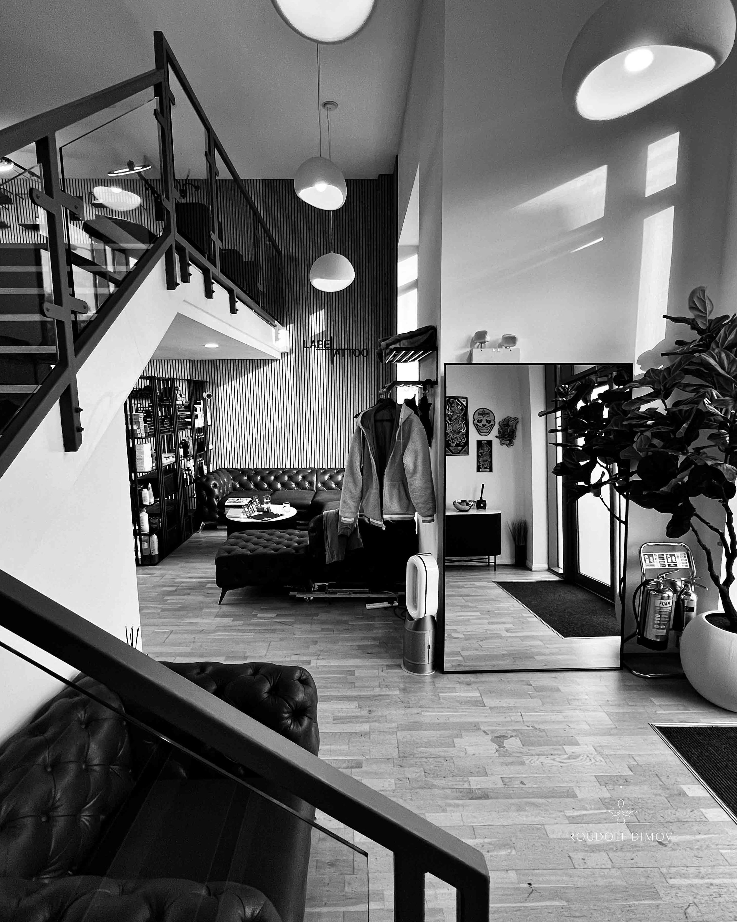 Label Tattoo studio interior in Kensington, London, featuring the workspace of black and grey realism tattoo artist Roudolf Dimov, offering custom tattoo appointments in London.