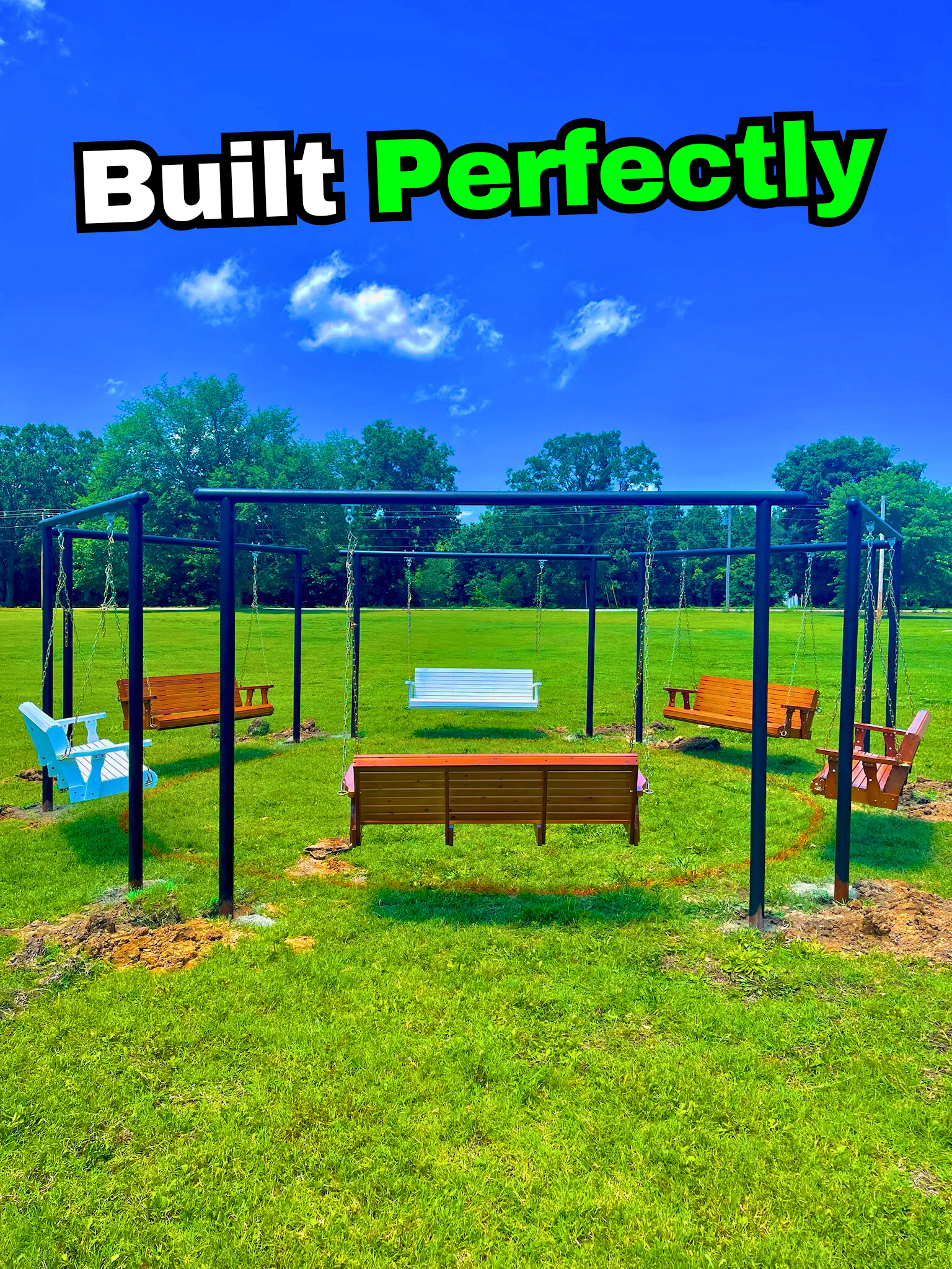 A swing set with colorful swings and benches in a grassy field with trees and blue sky in the background. Text overlay says 'Built Perfectly'.