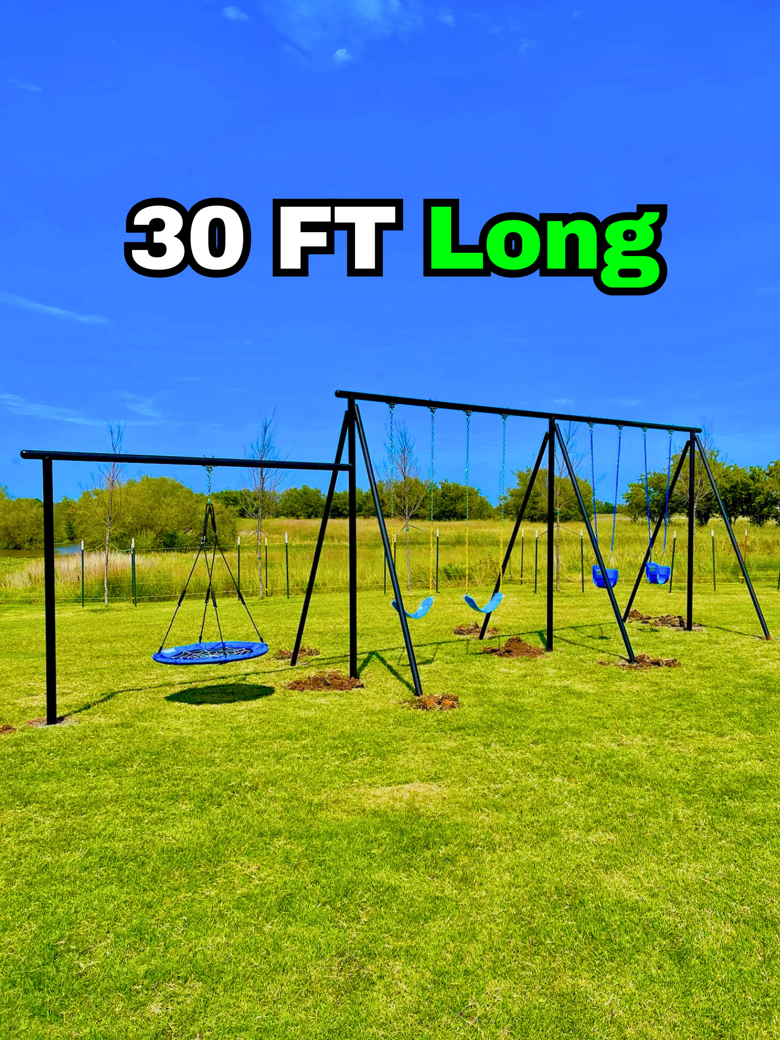 Playground with a swing set on a grassy field under a bright blue sky, with text indicating it's 30 feet long.