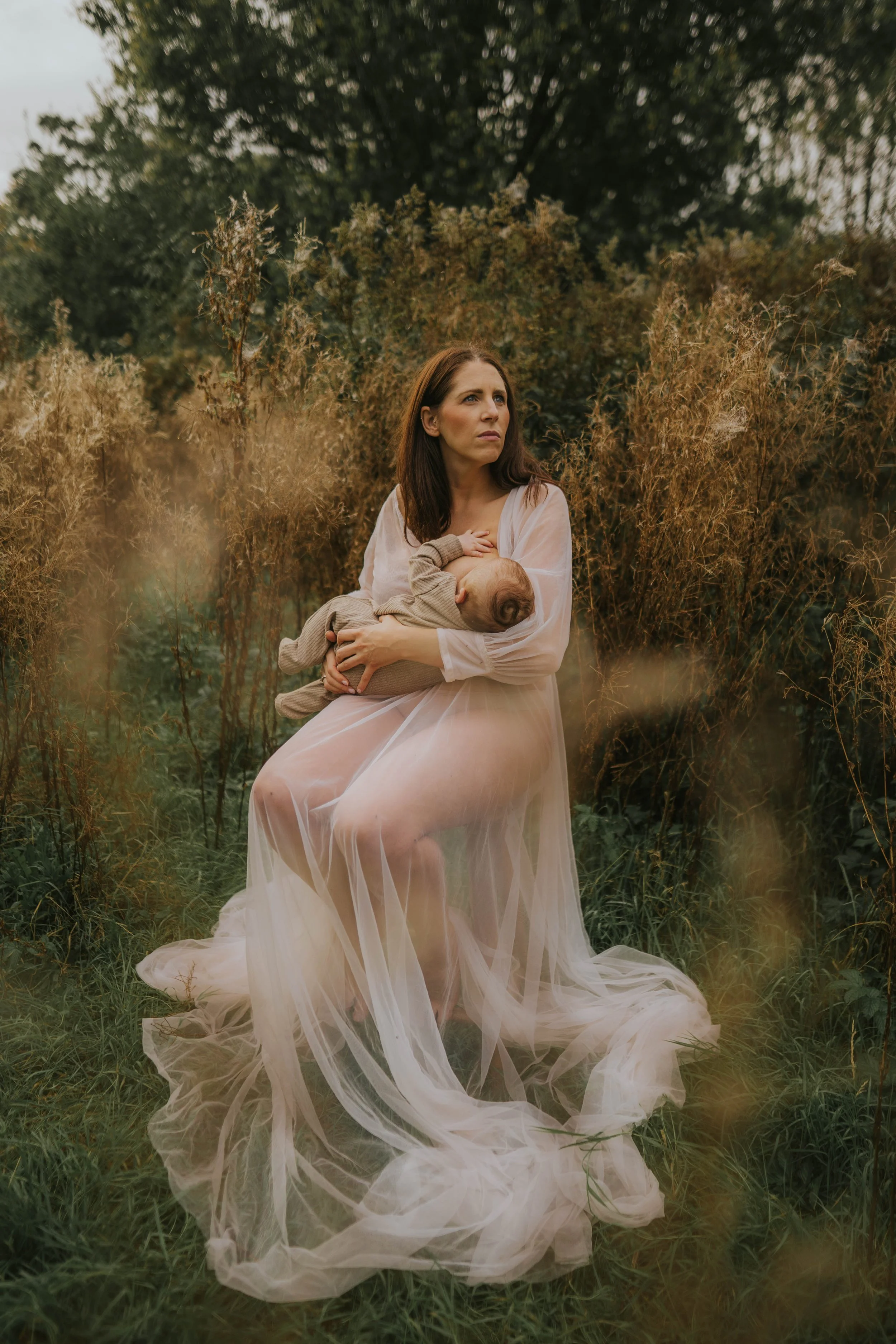 image of a mother with her newborn baby on a shoot in Didsbury Manchester