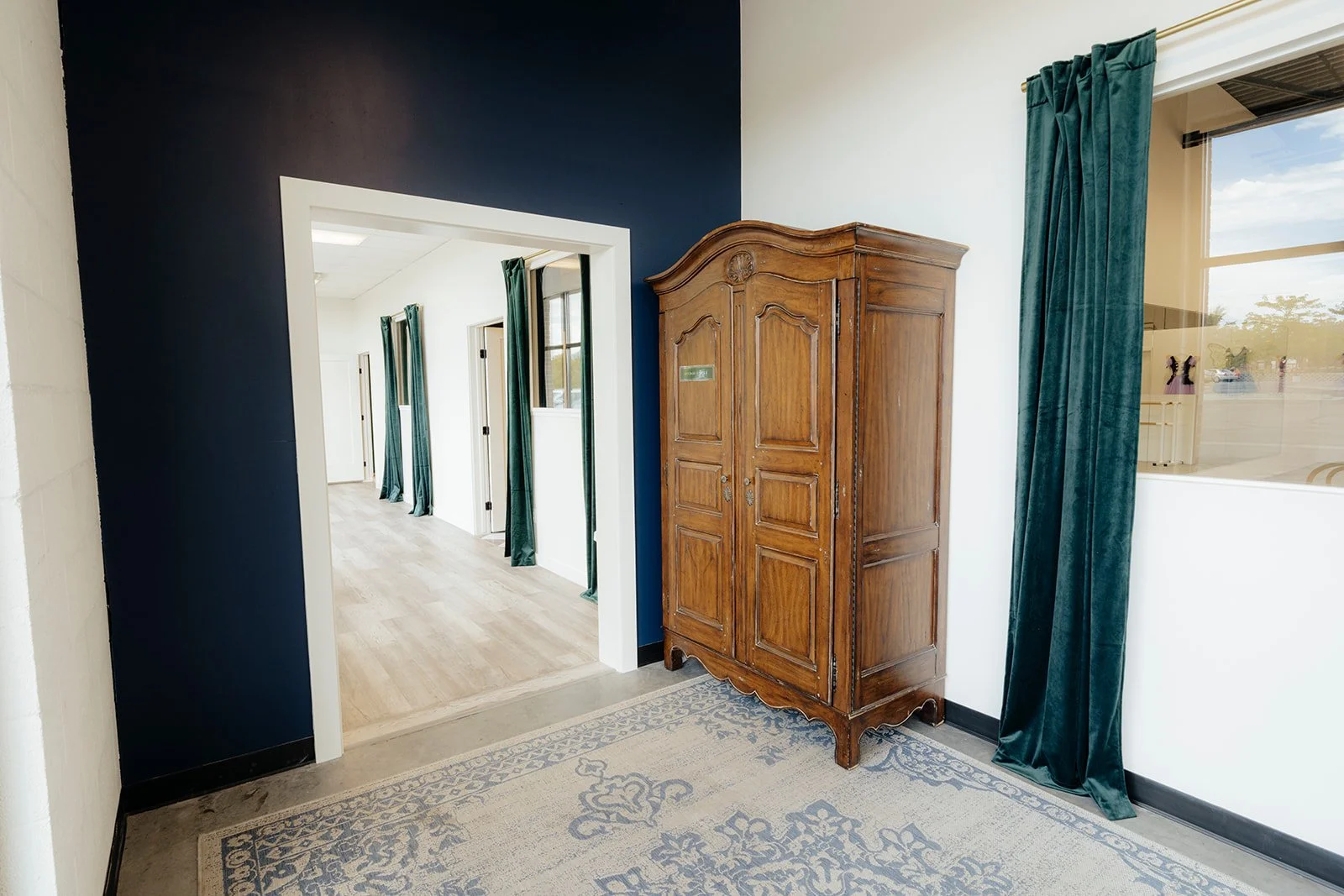 Our wardrobe holds our studio store with shoes, tights, leotards, and Elevé merchandise. 