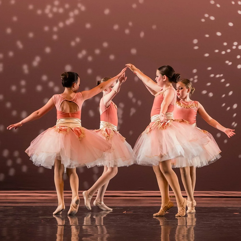 young girls performing their dance class routine