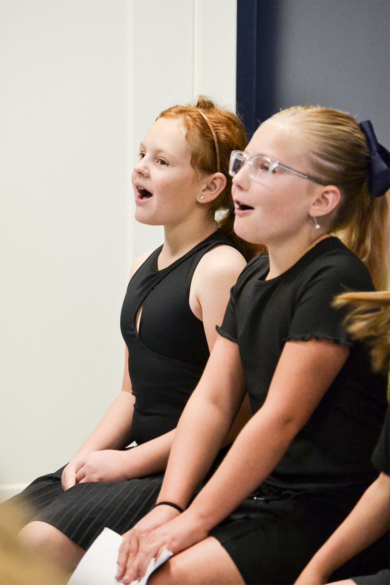 two young girls singing in musical theater class syracuse utah