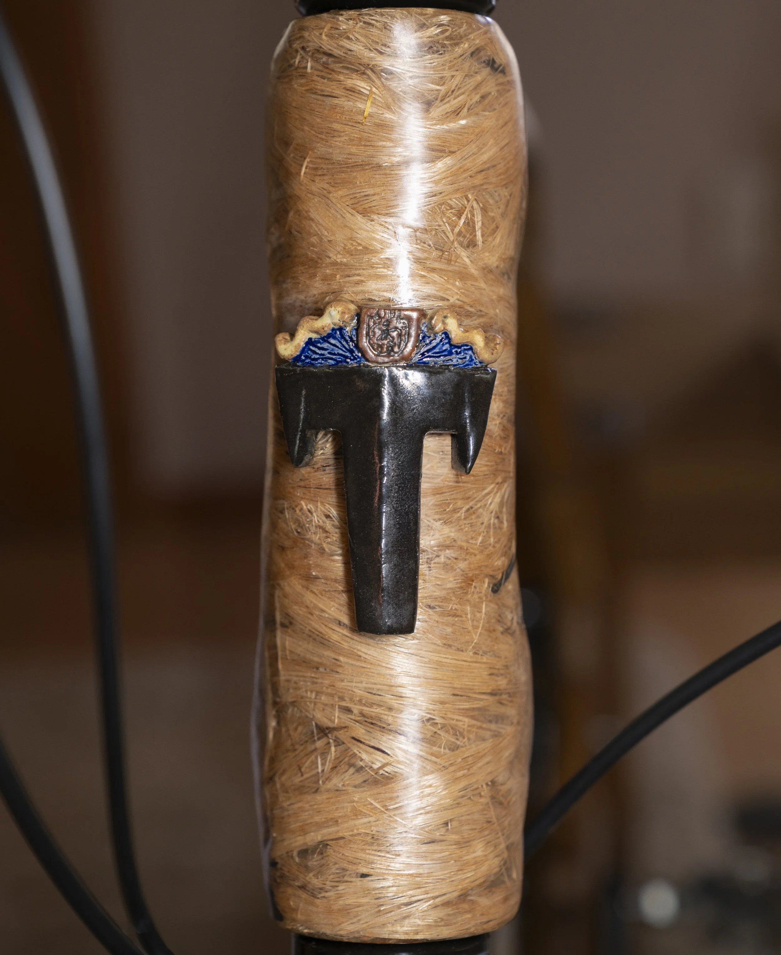 I had always meant to have a head badge created for this bike.  Originally, I was thinking metal, but got into sculpting clay a few years ago and finally built a badge based on an old family crest design.  So, now it's official - it's the first Thron