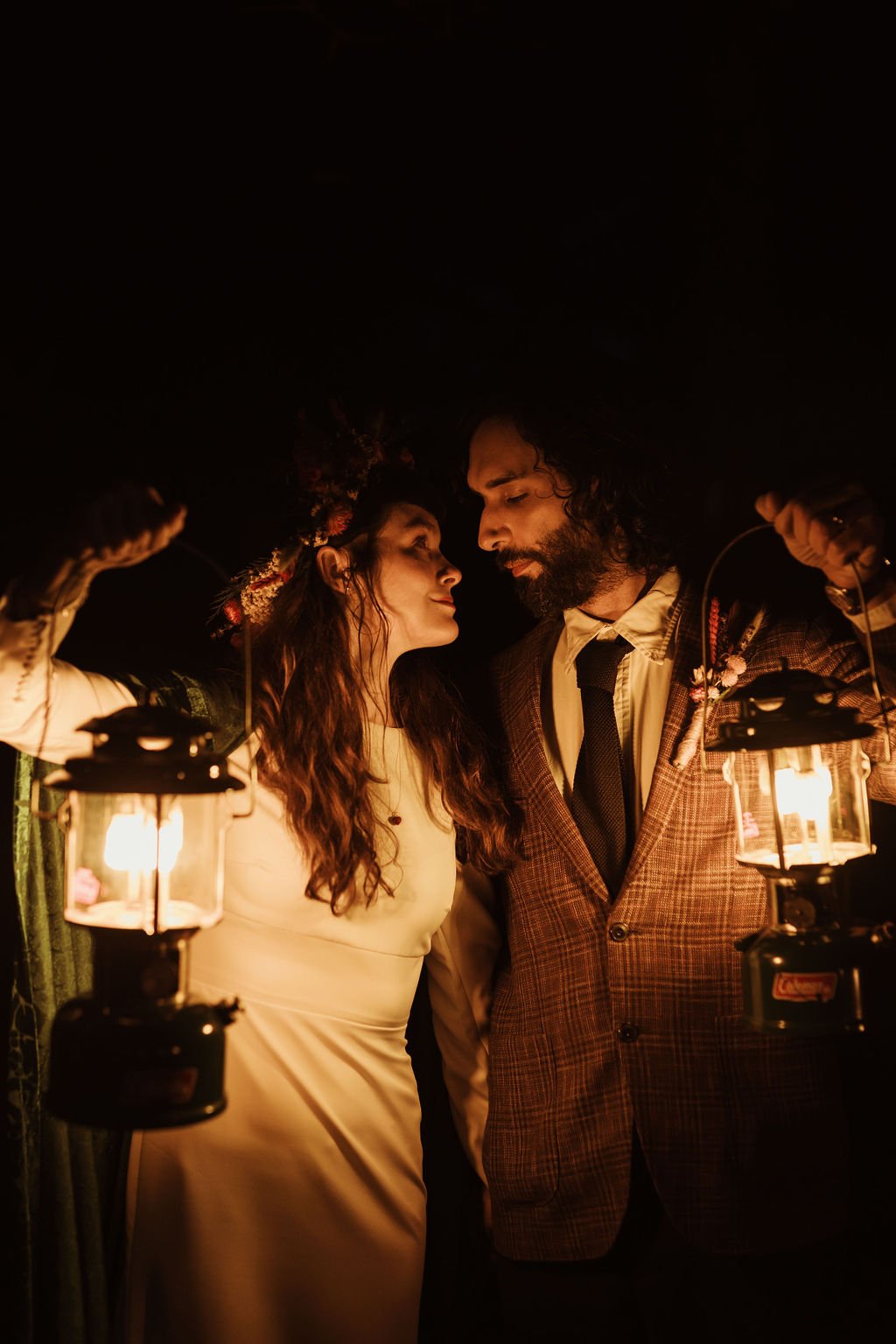 Bride and Groom holding lanterns