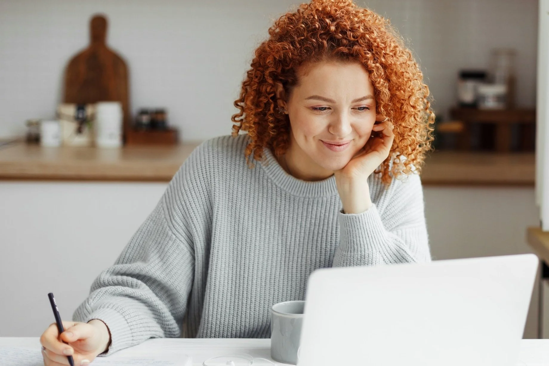 A caregiver working from home — illustrating the modern household dynamics Nanny Connie addresses in her coaching for parents and professional caregivers.
