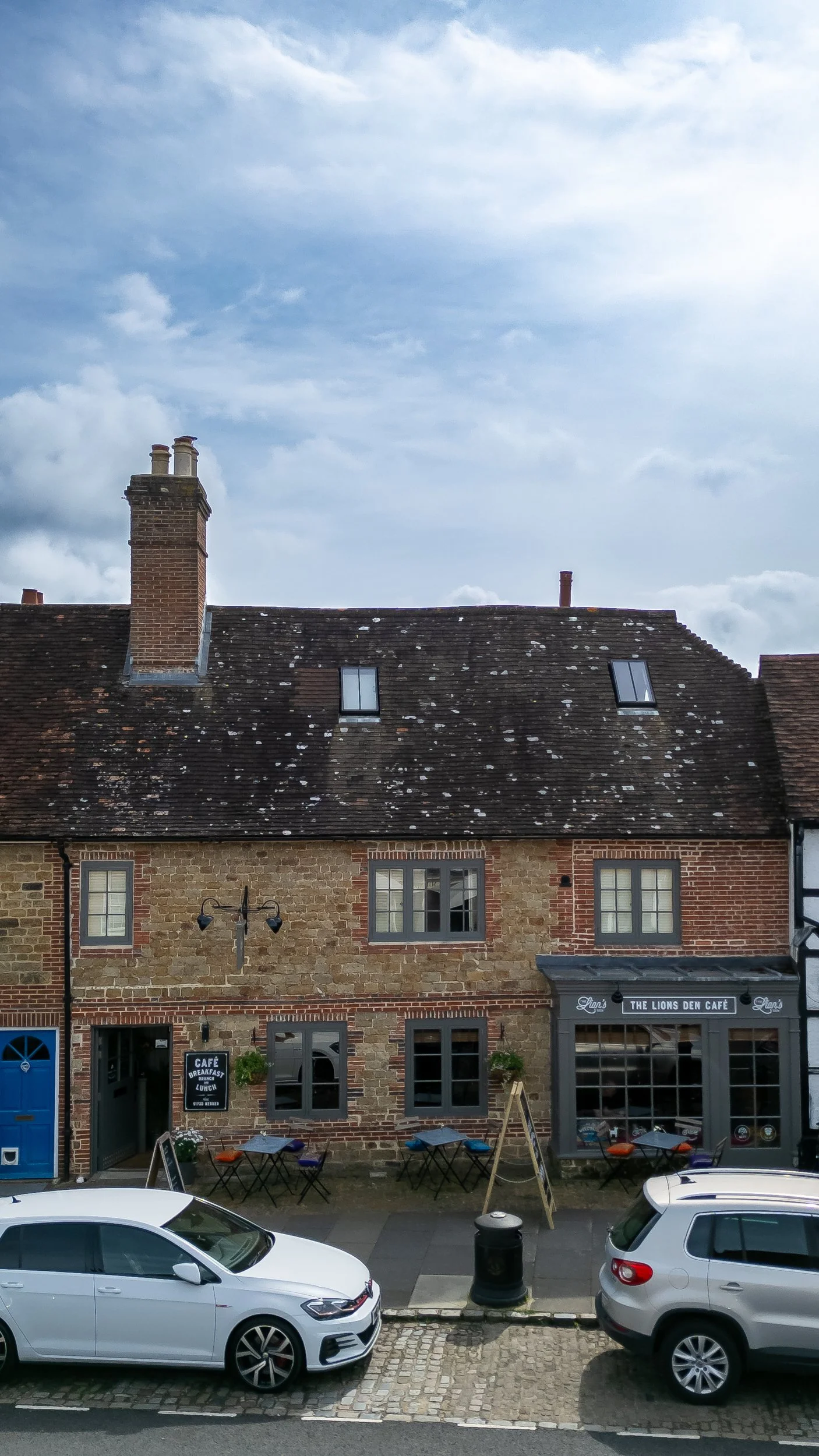 Portrait drone shot of café exterior – The Lion's Den Midhurst – Hospitality Venue Photography by Sequoia Studios